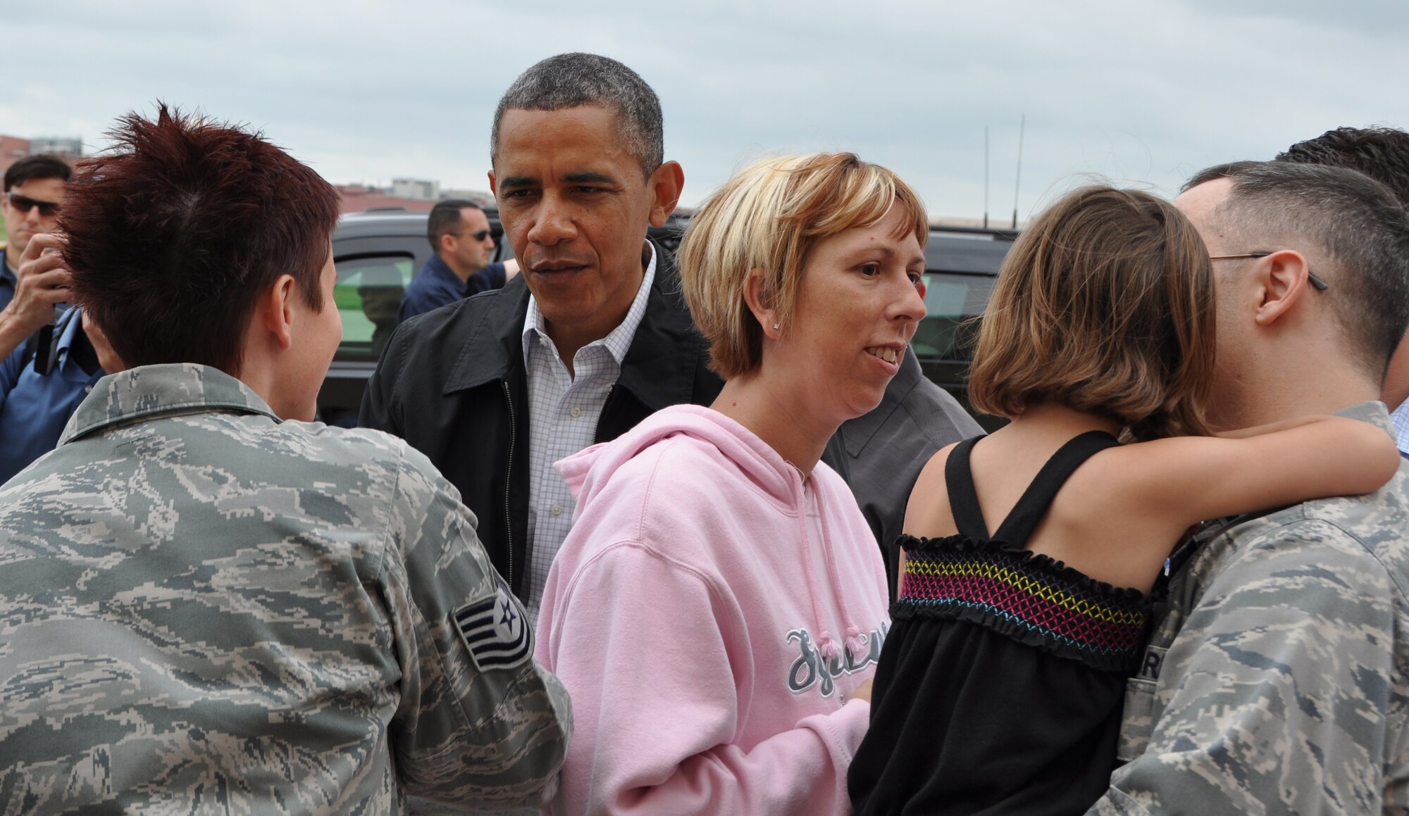 President Barack Obama greets reserve Tech Sgt. Lindsay Newton, 507th Maintenance Squadron at Tinker Air Force Base, May 26. The president landed at Tinker Air Force Base on his way to Moore, Okla. to survey the tornado devastation and meet with victims and first responders. Tinker employees that were personally affected by the May 20 tornado and base first responders got the opportunity to meet the president. (U.S. Air Force photo/Maj. Jon Quinlan)  