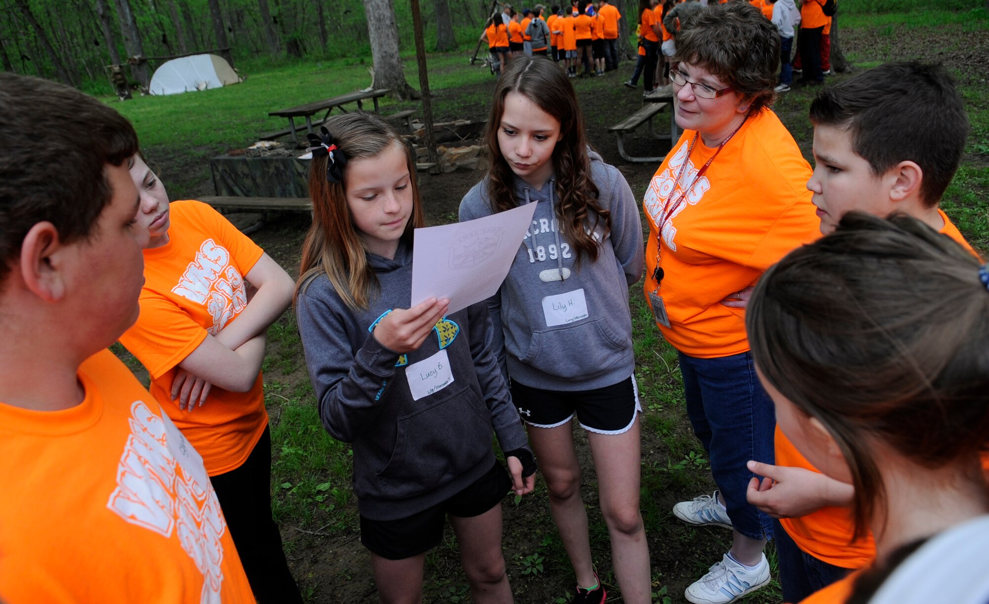Warrensburg Middle School seventh-graders participated in a survival day with survival, evasion, resistance and escape (SERE) specialists in Knob Noster State Park, Mo., May 10, 2013. More than 140 students took a survival scenario quiz which included questions on what items they would need to bring during a cold day in winter. (U.S. Air Force photo by Staff Sgt. Alexandra M. Boutte/Released)