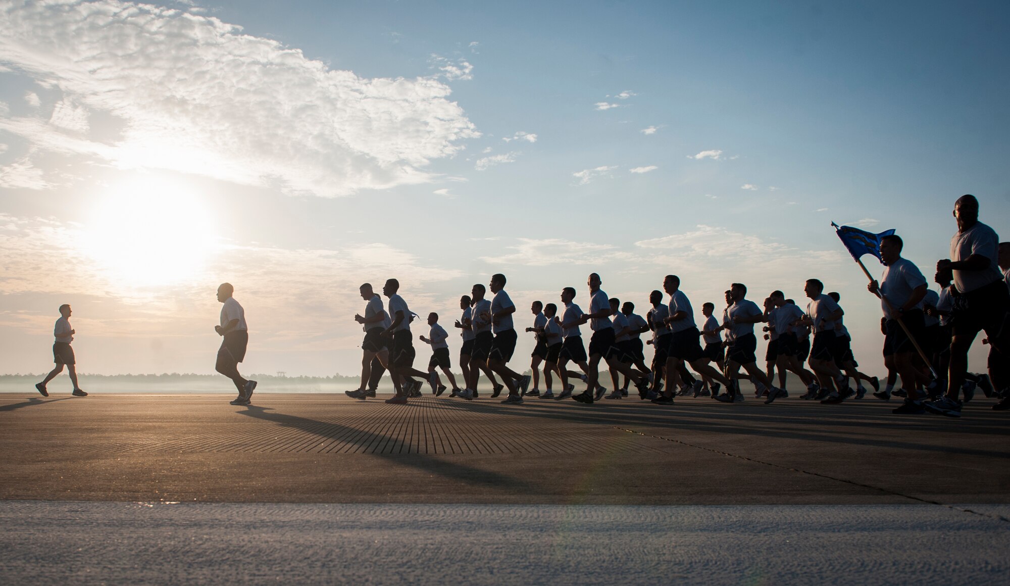A flight of Moody Airmen participate in a 2.3-mile run as part of Comprehensive Airman Fitness (CAF) Day at Moody Air Force Base, Ga., May 17, 2013. The CAF Program is designed to help foster resilient Airmen and families. (U.S. Air Force photo by Senior Airman Jarrod Grammel/Released)
