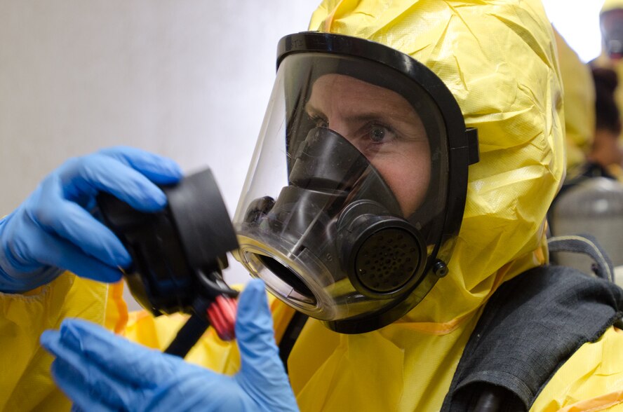 A U.S. Airman assigned to the California National Guard’s Homeland Response Force (HRF) operates a self contained breathing apparatus during a training exercise at Naval Base Coronado, Calif., May 21, 2013. More than 100 Airmen from the Missouri and California National Guard’s HRF received emergency response training on natural disasters and domestic terrorist attacks. (U.S. Air National Guard photo by Tech. Sgt. Michael Crane/Released)
