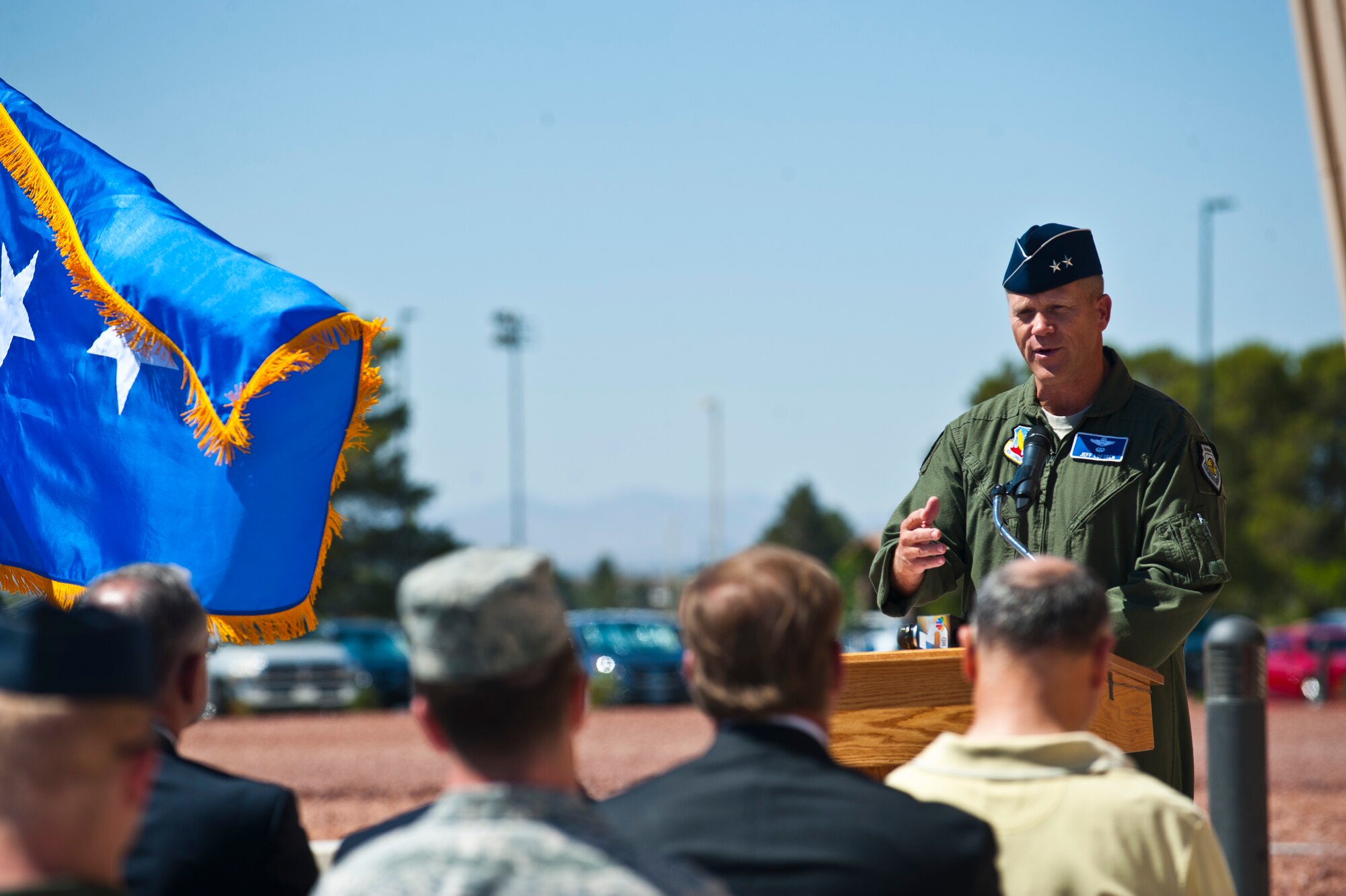 Maj. Gen. Jeffrey Lofgren, U.S. Air Force Warfare Center commander, speaks live virtual constructive concept at the  F-35 simulator facility ribbon cutting ceremony May 23, 2013, at Nellis Air Force Base, Nev. The building was built to house simulators  that will provide virtual training for pilots which can then be incorporated into hands-on training. (U.S. Air Force photo/Senior Airman Brett Clashman) 