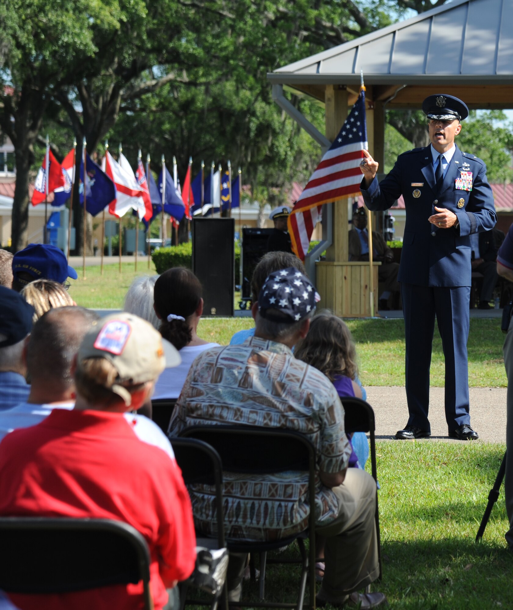 Brig. Gen. Brad Spacy, 81st Training Wing commander, spoke to more than 200 community representatives, veterans and family members during a Memorial Day ceremony at the Biloxi National Cemetery May 27, 2013.  He talked about the many sacrifices made by veterans and the price of freedom today. The Keesler Honor Guard also participated in the event.  (U.S. Air Force photo by Kemberly Groue)