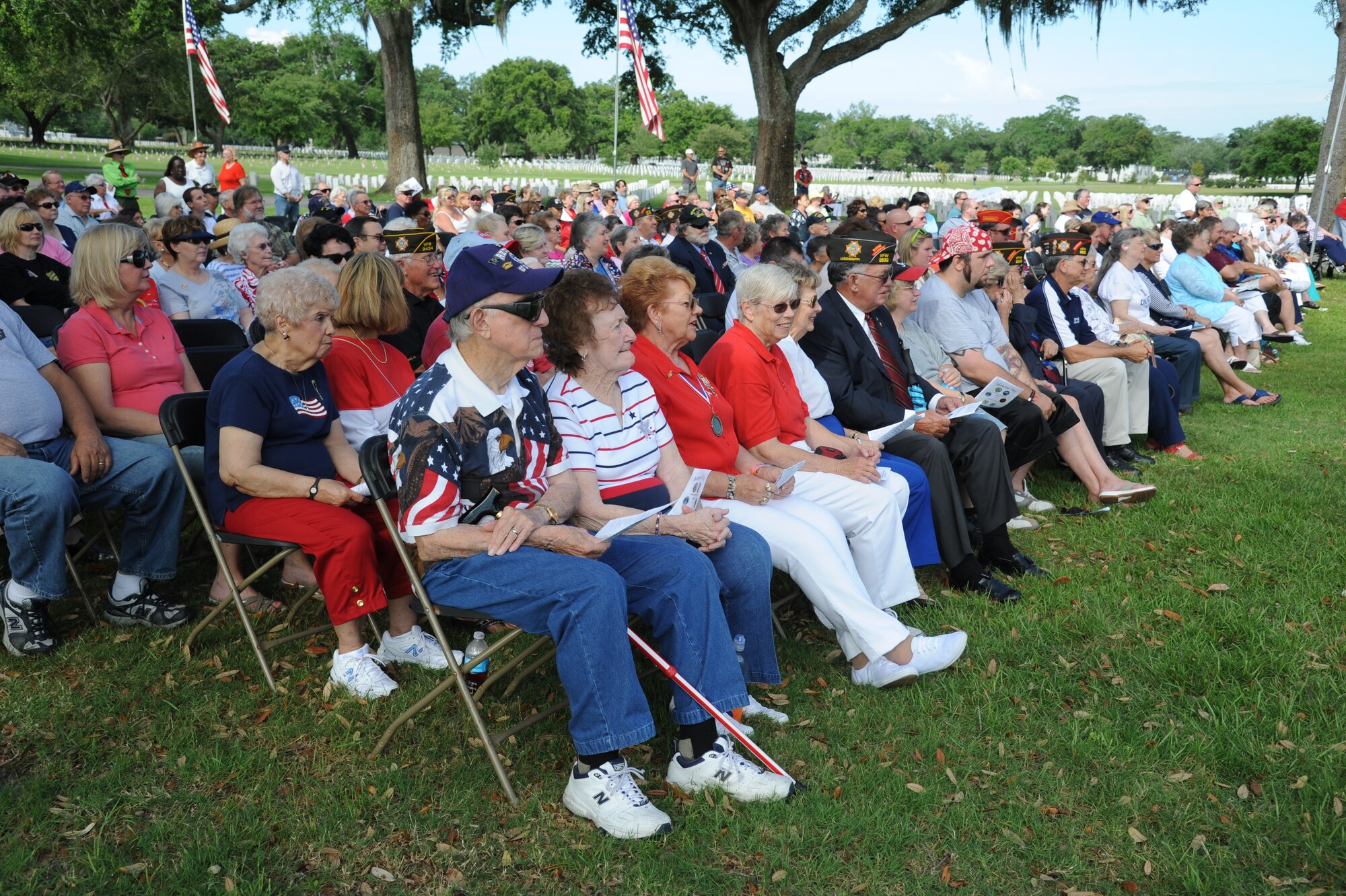 More than 200 community representatives, veterans and family members attend the Memorial Day ceremony at the Biloxi National Cemetery May 27, 2013.  Brig. Gen. Brad Spacy, 81st Training Wing commander, was the keynote speaker for the event where he talked about the many sacrifices made by veterans and the price of freedom today.  The Keesler Honor Guard also participated in the event.  (U.S. Air Force photo by Kemberly Groue)