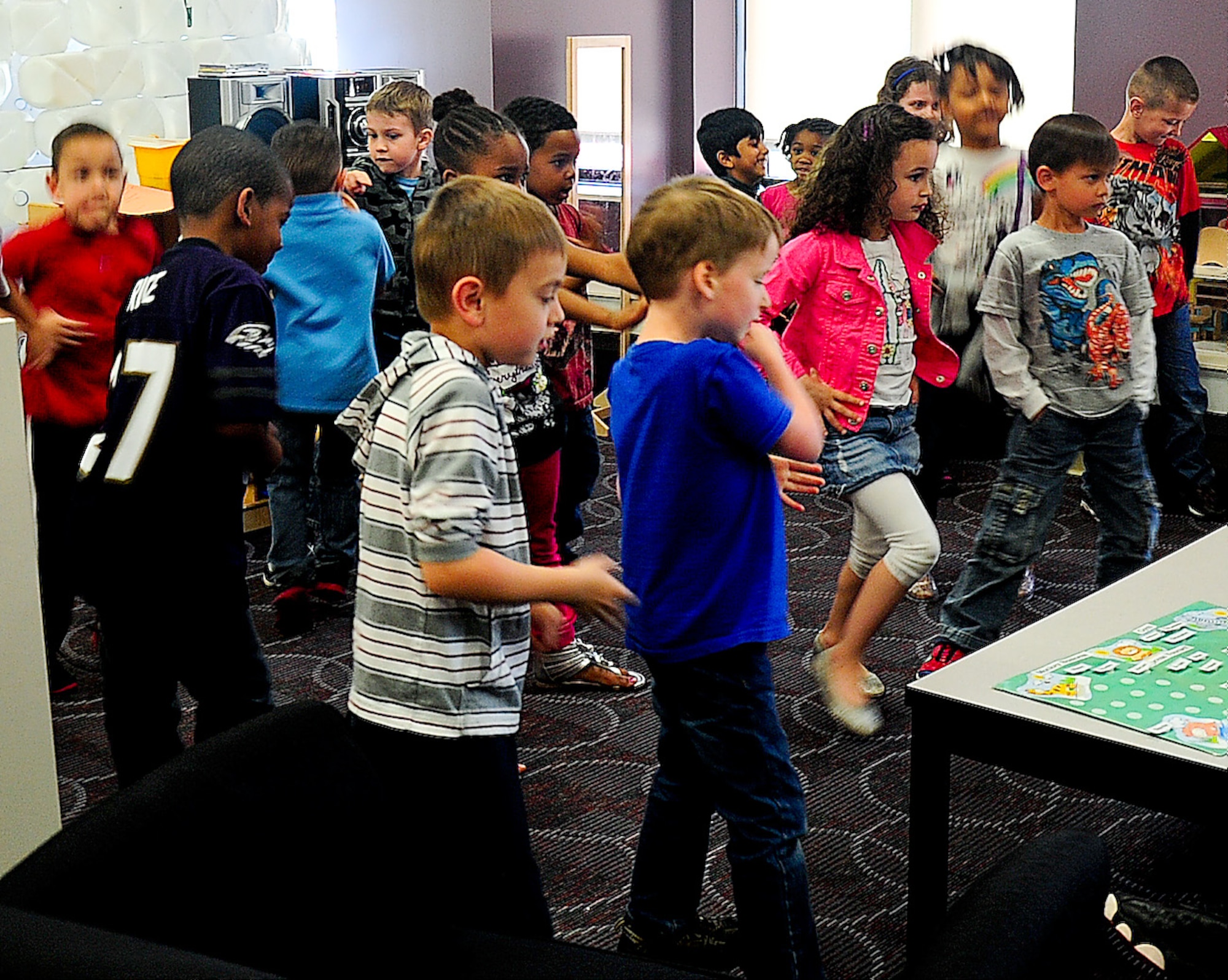 Children have a dance competition in one of the classrooms May 13, 2013, at the Youth Center on Dover Air Force Base, Del. The Youth Center is where children from five to 18-years-old can go after school to play and do their homework. (U.S. Air Force photo/Airman 1st Class Ashlin Federick)