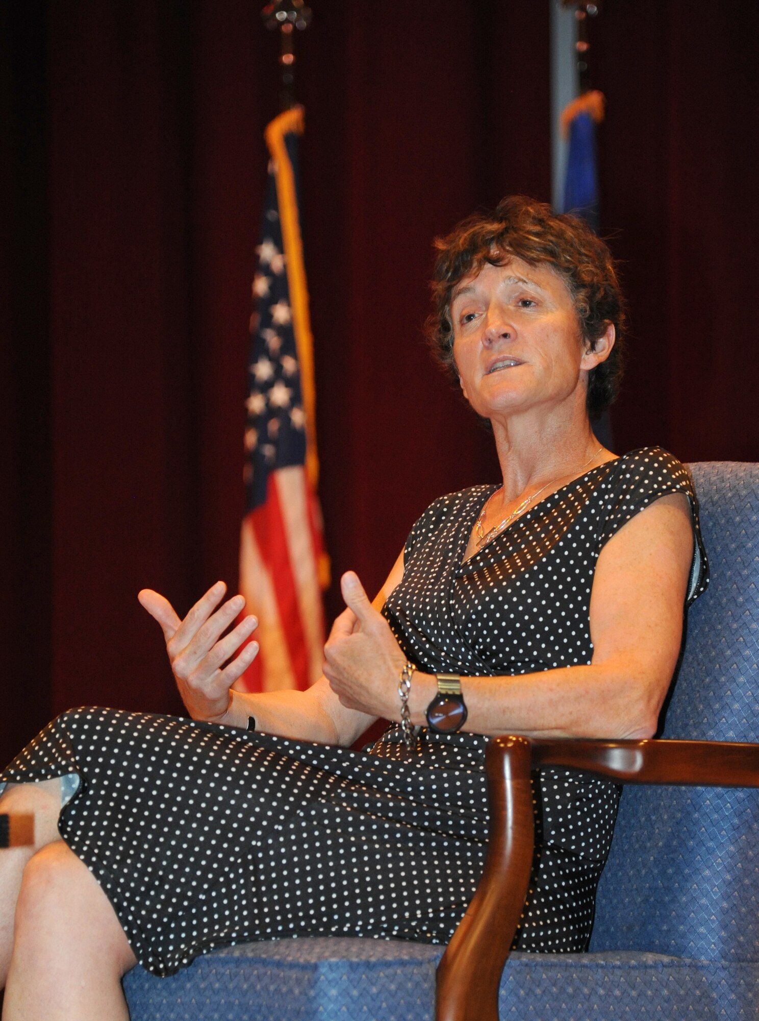 Linda Ambard, widow of Maj. Phil Ambard, speaks to 336th Training Squadron students on resiliency and wingmanship May 24, 2013, at the Welch Theater, Keesler Air Force Base, Miss.   Ambard related the challenges she’s faced with the adversity the young Airmen will likely encounter and overcome in their careers.  (U.S. Air Force photo by Kemberly Groue)