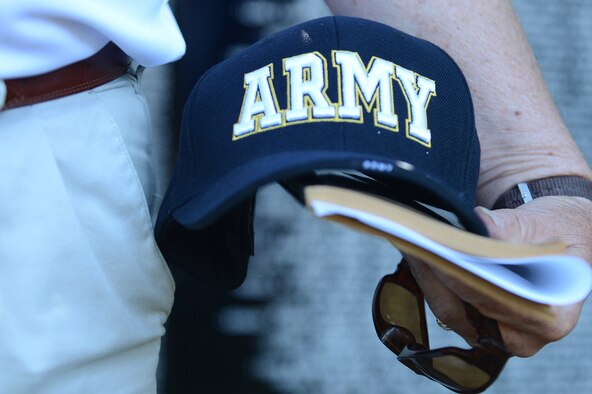 Rod Myers, retired U.S. Army lieutenant colonel, stands in front of the Traveling Vietnam Memorial Wall during the dedication ceremony at Swan Lake Iris Gardens, Sumter, S.C., May 24, 2013. The traveling memorial wall is a three-fifths scale replica of the Vietnam Memorial in Washington, D.C. The wall stands as a reminder of the great sacrifices made during the Vietnam War. (U.S. Air Force photo by Airman 1st Class Daniel Blackwell/Released)