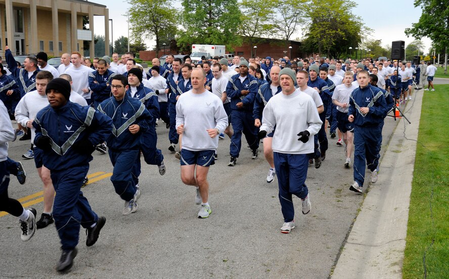 Members of Team Fairchild take off from the starting line during the wing run as a kickoff to the “101 critical days of summer” event at Fairchild Air Force Base, Wash., May 23, 2013. The run covers about 2.5 miles around the base, starting and ending at Miller Park. (U.S. Air Force photo by Airman 1st Class Ryan Zeski)