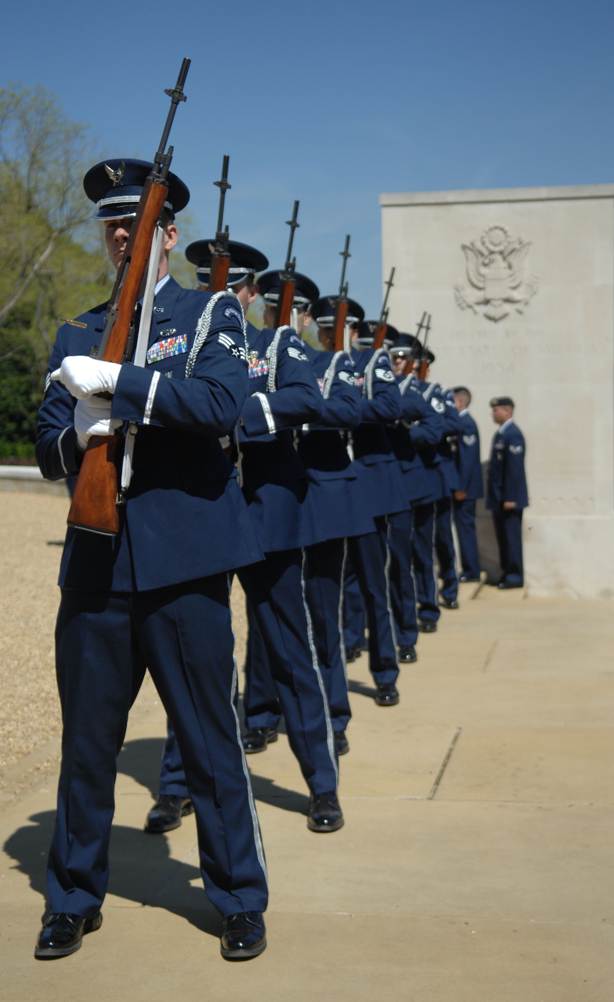 Honor Guard members perform a 21-gun salute during a Memorial Day ceremony May 27, 2013, at the Madingley American Cemetery in Cambridge, England. Memorial Day originated after the American Civil War and is recognized annually in memoriam of the fallen. (U.S. Air Force photo by Airman 1st Class Dillon Johnston/Released)