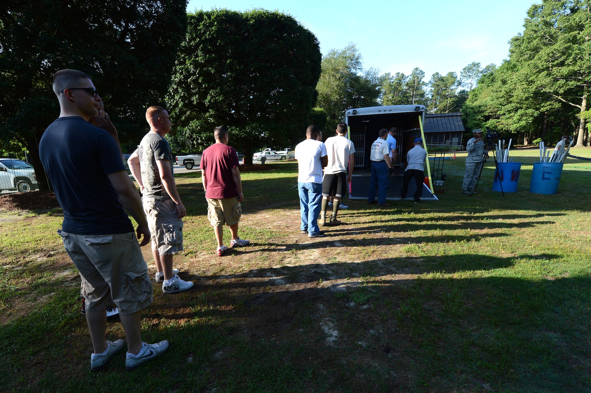 U.S. Air Force Airmen from Shaw Air Force Base and volunteers from the local community unload the truck for the building of the traveling Vietnam Wall memorial at Swan Lake, Sumter S.C., May 23, 2013.  Volunteers watched the wall for 24-hour shifts to commemorate the sacrifice made by the service members whose names are on the wall.  (U.S. Air Force photo by Airman 1st Class Nicole Sikorski/Released) 