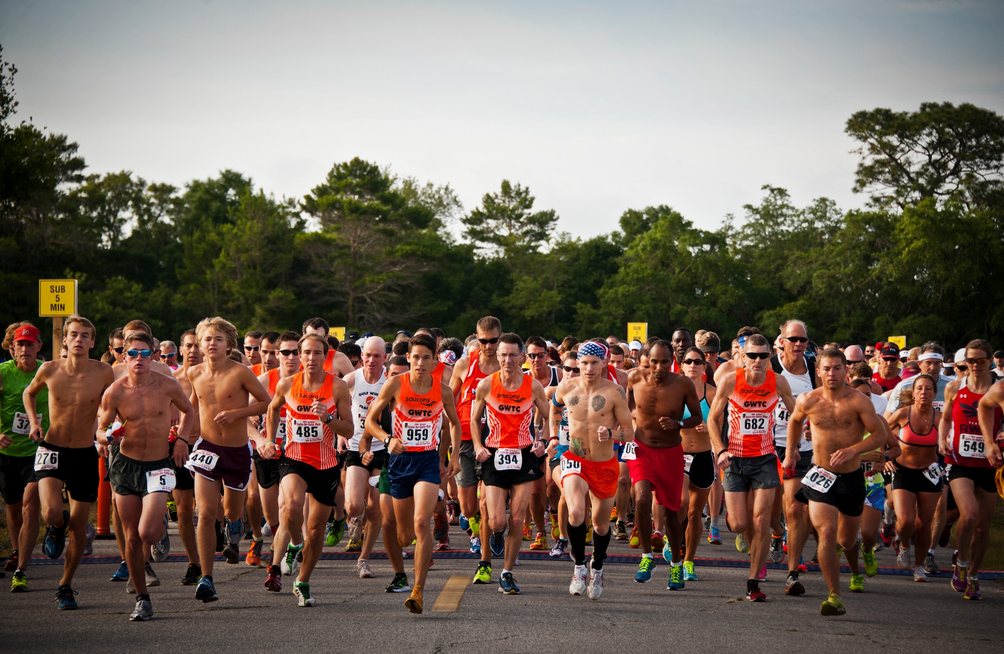 The fastest racers take off first at the 28th annual Gate to Gate Run May 27 at Eglin Air Force Base, Fla.  More than 1,500 people participated in the Memorial Day race.  Many of the runners paid their respects by dropping off flowers in front of the All Wars Memorial as they raced by.  (U.S. Air Force photo/Samuel King Jr.)