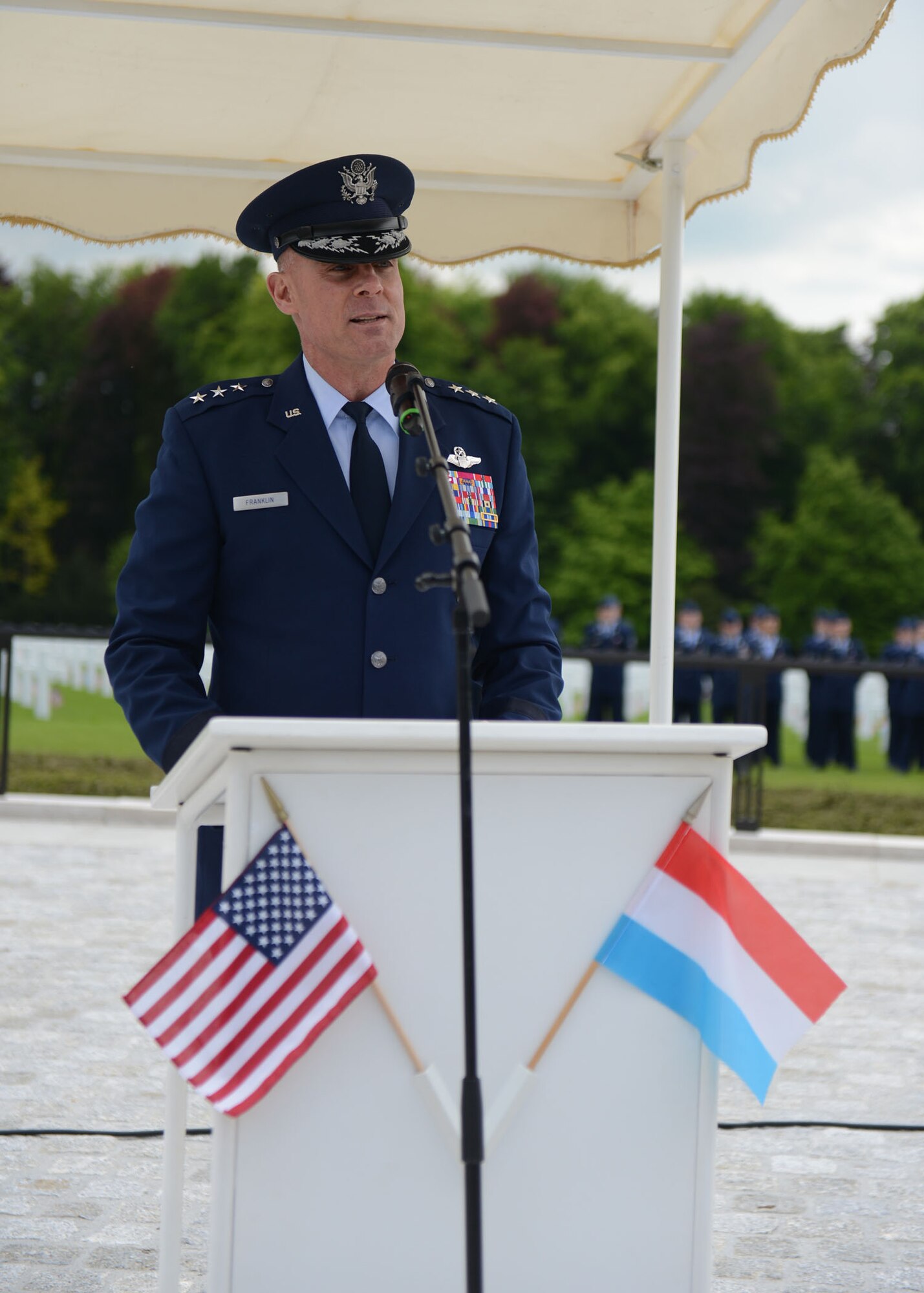 LUXEMBOURG – U.S. Air Force Lt. Gen. Craig Franklin, 3rd Air Force and 17th Expeditionary Air Force commander, speaks during a Memorial Day commemoration at the Luxembourg American Military Cemetery and Memorial May 25, 2013. Franklin thanked all who came to the ceremony for taking the time to honor fellow comrades-in-arms who will never be forgotten. (U.S. Air Force photo by Airman 1st Class Gustavo Castillo/Released)
