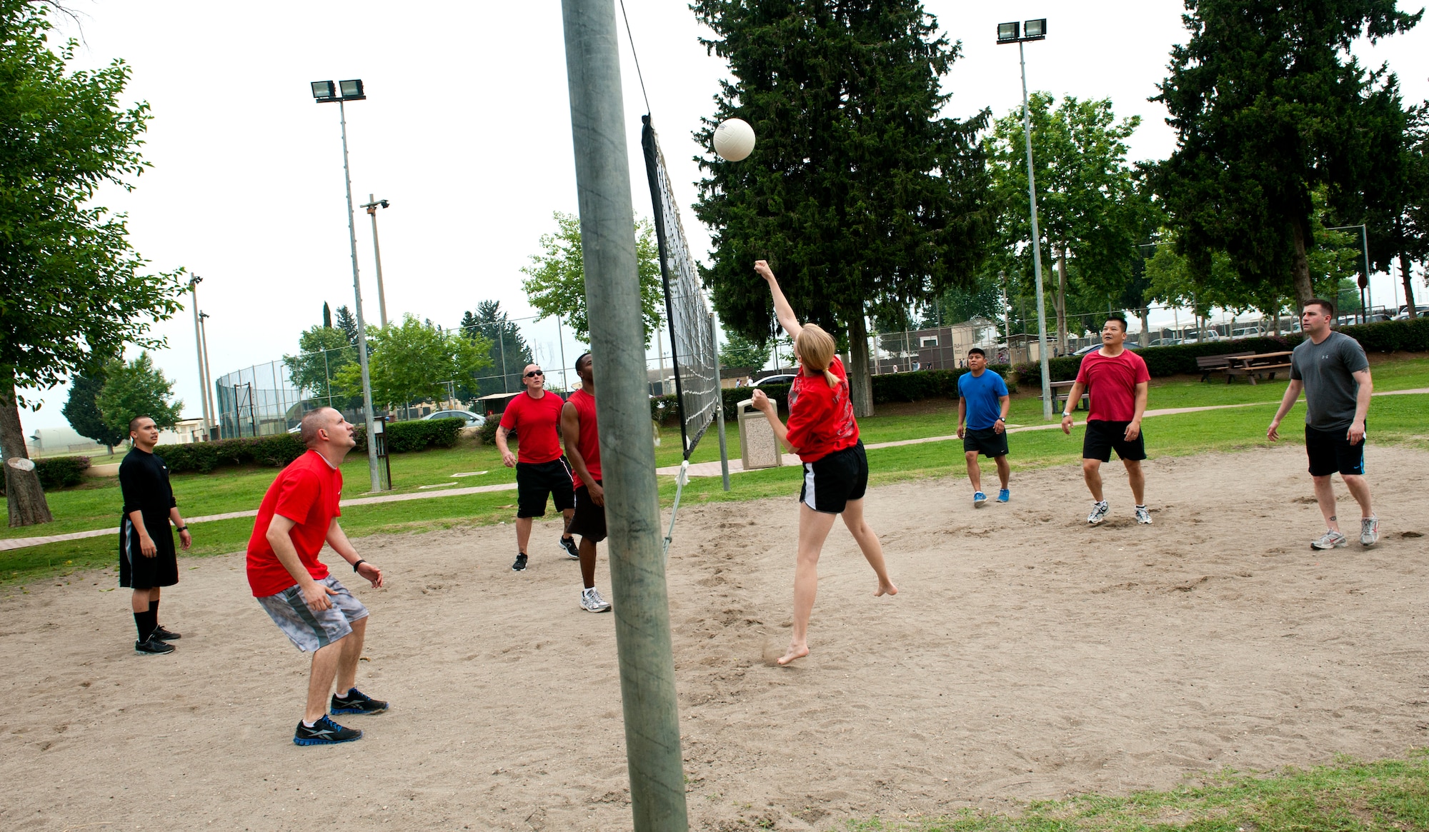 Team Incirlik members play sand volleyball during the 39th Air Base Wing Sports Day May 24, 2013, at Incirlik Air Base, Turkey.   Sports day was designed to build teamwork and camaraderie among different work sections by competing in various sporting events for the commander's trophy. (U.S. Air Force photo by Senior Airman Daniel Phelps/Released)