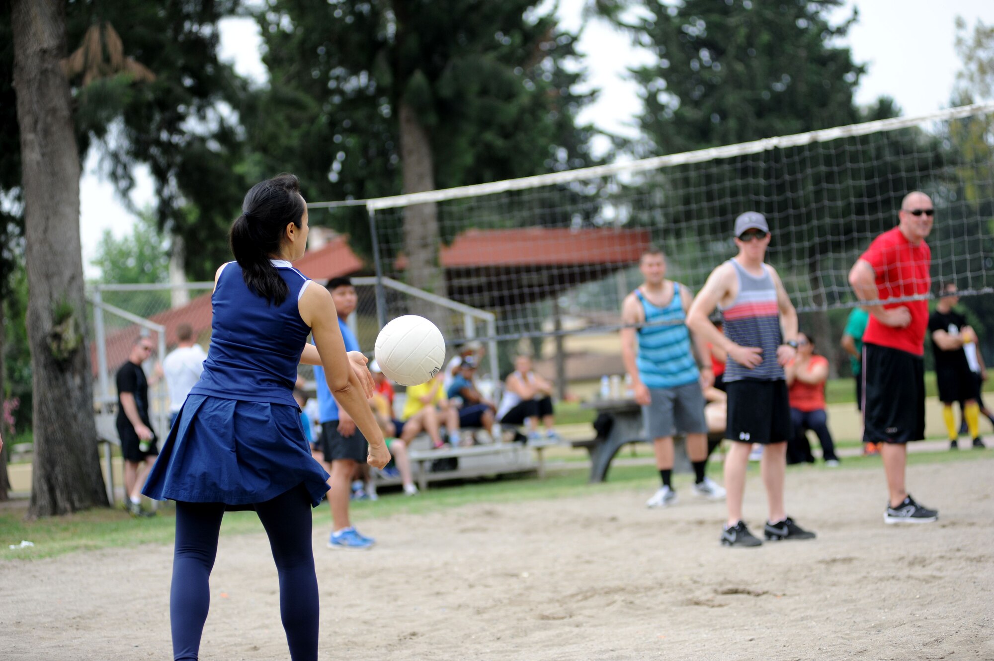Participants compete in a game of sand volleyball during the 39th Air Base Wing Sports Day May 24, 2013, at Incirlik Air Base, Turkey. The 39th Air Base Wing Sports Day was designed to build teamwork and camaraderie among different work sections by competing in various sporting events for the commander's trophy. (U.S. Air Force photo by Senior Airman Jarvie Z. Wallace/Released)  