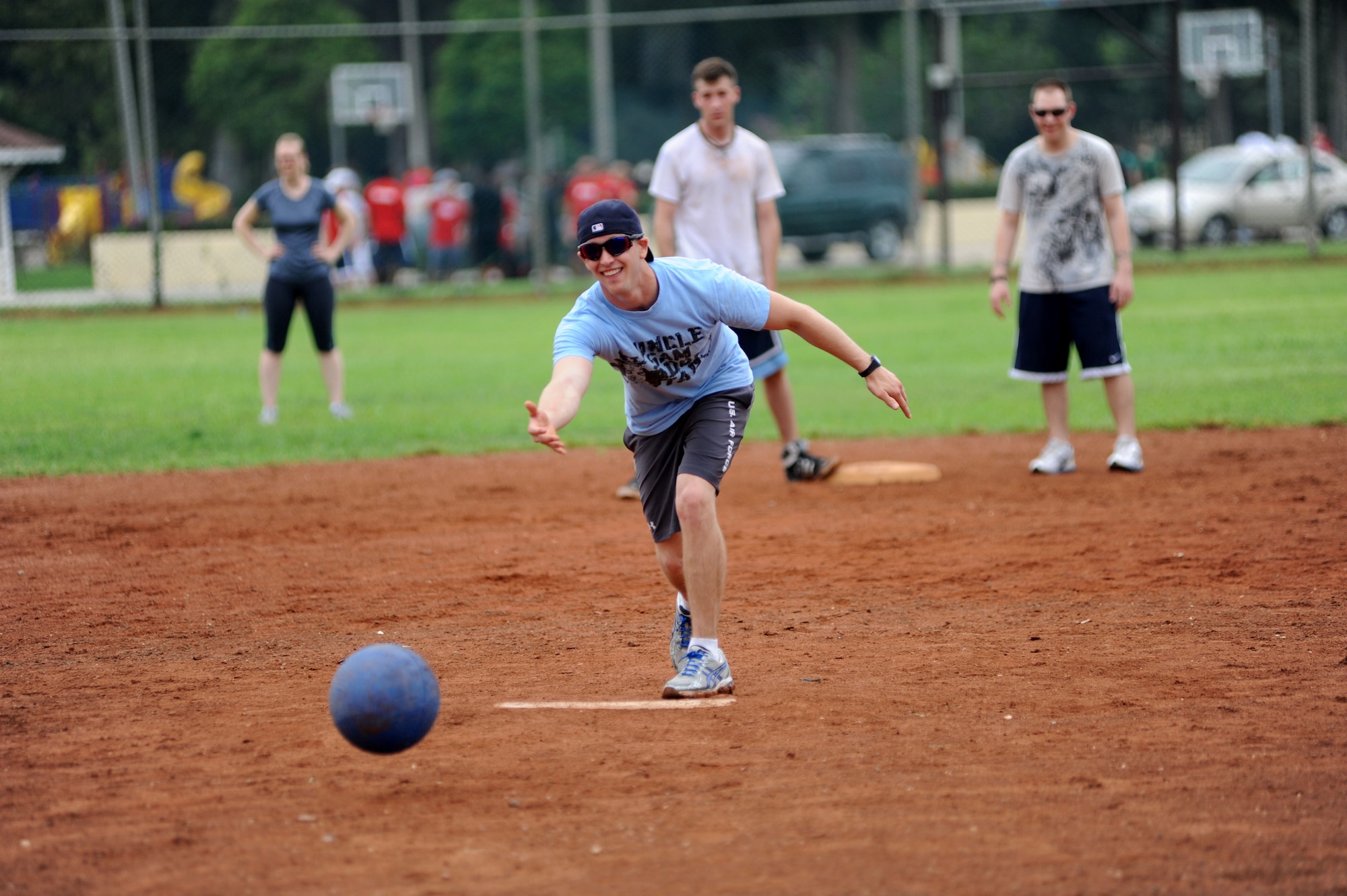 Dustin Doyda, 39th Security Forces Squadron, delivers a pitch in a game of kickball during the 39th Air Base Wing Sports Day May 24, 2013, at Incirlik Air Base, Turkey. The 39th SFS team won the game 15-2. (U.S. Air Force photo by Senior Airman Jarvie Z. Wallace/Released)  