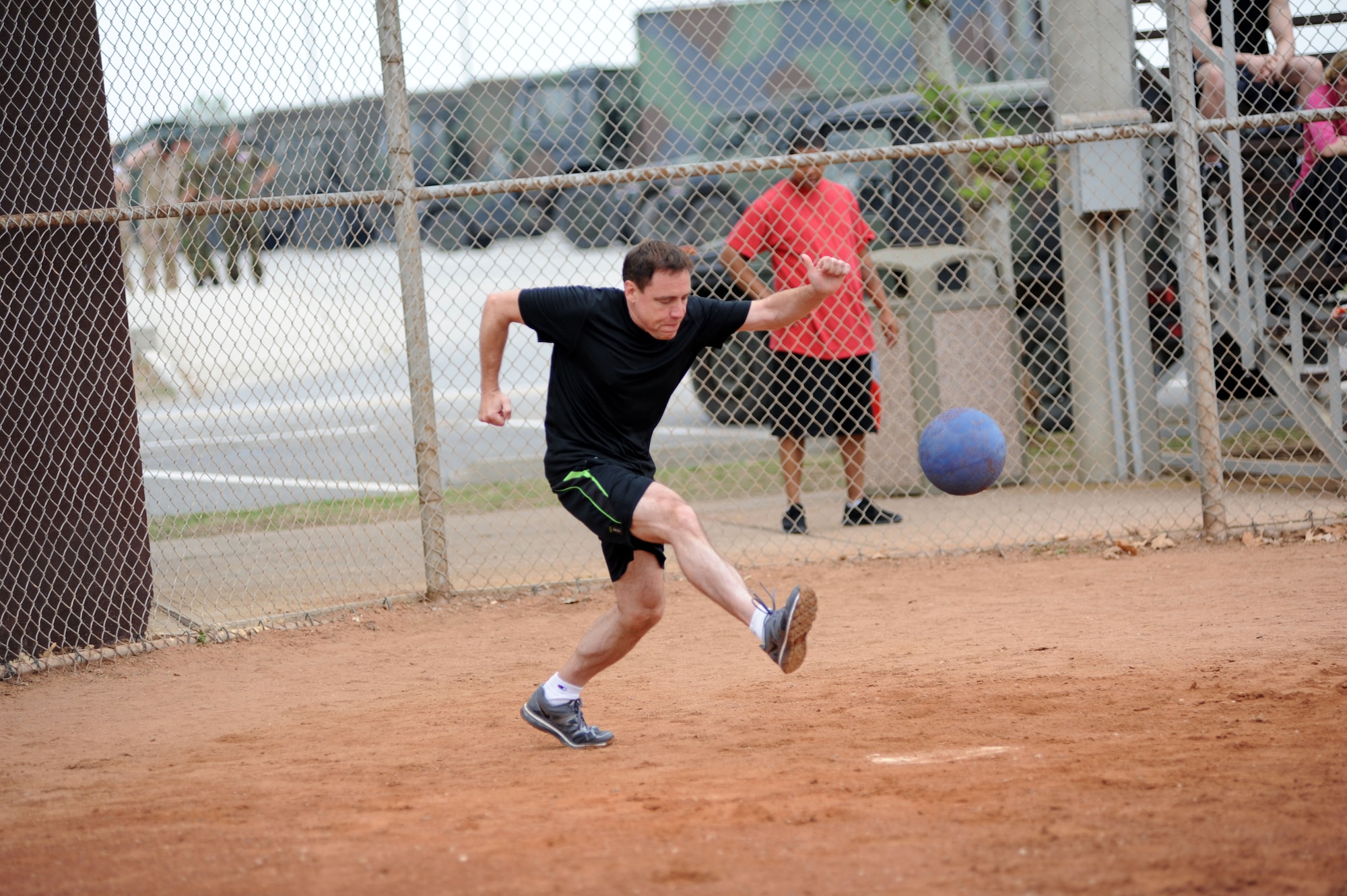 Robert Monagle, 39th Air Base Wing, makes a base hit in a game of kickball during the 39th Air Base Wing Sports Day May 24, 2013, at Incirlik Air Base, Turkey. The 39th Air Base Wing Sports Day was designed to build teamwork and camaraderie among different work sections by competing in various sporting events for the commander's trophy. (U.S. Air Force photo by Senior Airman Jarvie Z. Wallace/Released)   