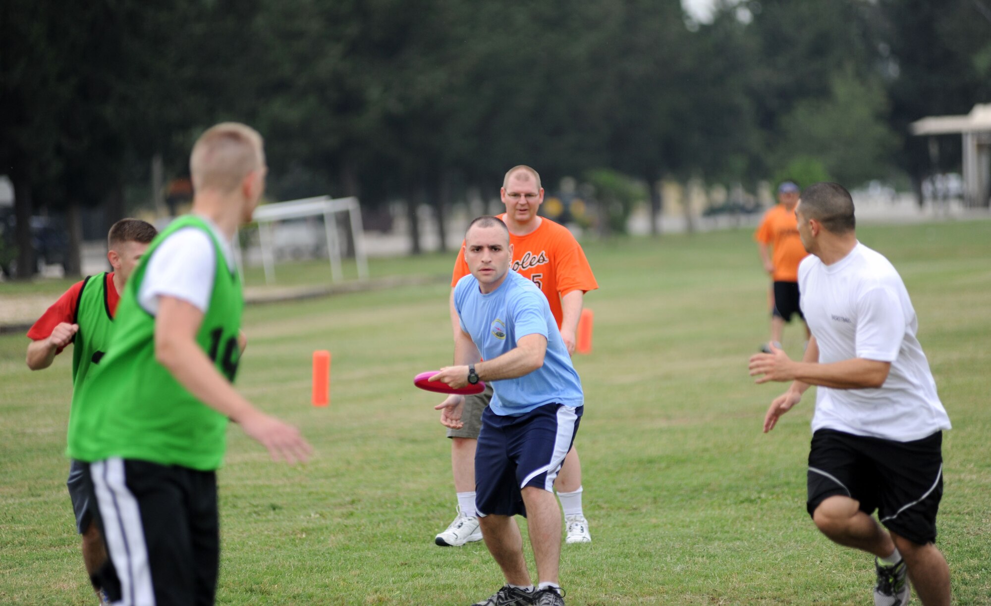 Participants compete in a game of ultimate frisbee during the 39th Air Base Wing Sports Day May 24, 2013, at Incirlik Air Base, Turkey. Sports day was an event that brought Airmen together through sports and recreation. Airmen from several squadrons competed in friendly games of volleyball, softball, basketball, kickball, dodgeball and tug-of-war. (U.S. Air Force photo by Senior Airman Jarvie Z. Wallace/Released)  