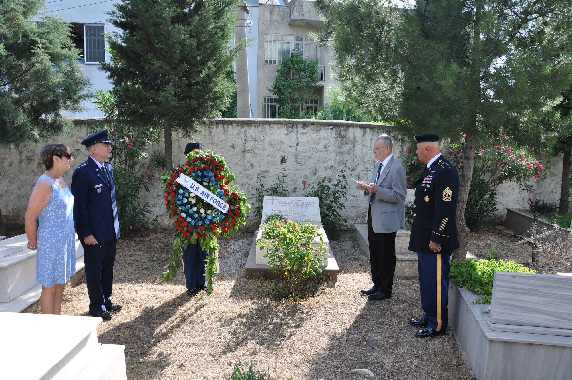 Lt. Gen. Ralph Jodice II, NATO Headquarters Allied Air Command Izmir 
commander, and his wife Judy Jodice, Sgt. Maj. Necati Akpinar, Senior Enlisted Advisor to NATO Allied Land Command HQ Izmir commander, and Jerry Deady, U.S. Army NATO National Support Element chief, prepare to lay a wreath at 
Karabaglar Pasa Köprü Cemetery May 27, 2013, in Izmir, Turkey. (U.S. Air Force photo by Tanju Varlikli/Released)
