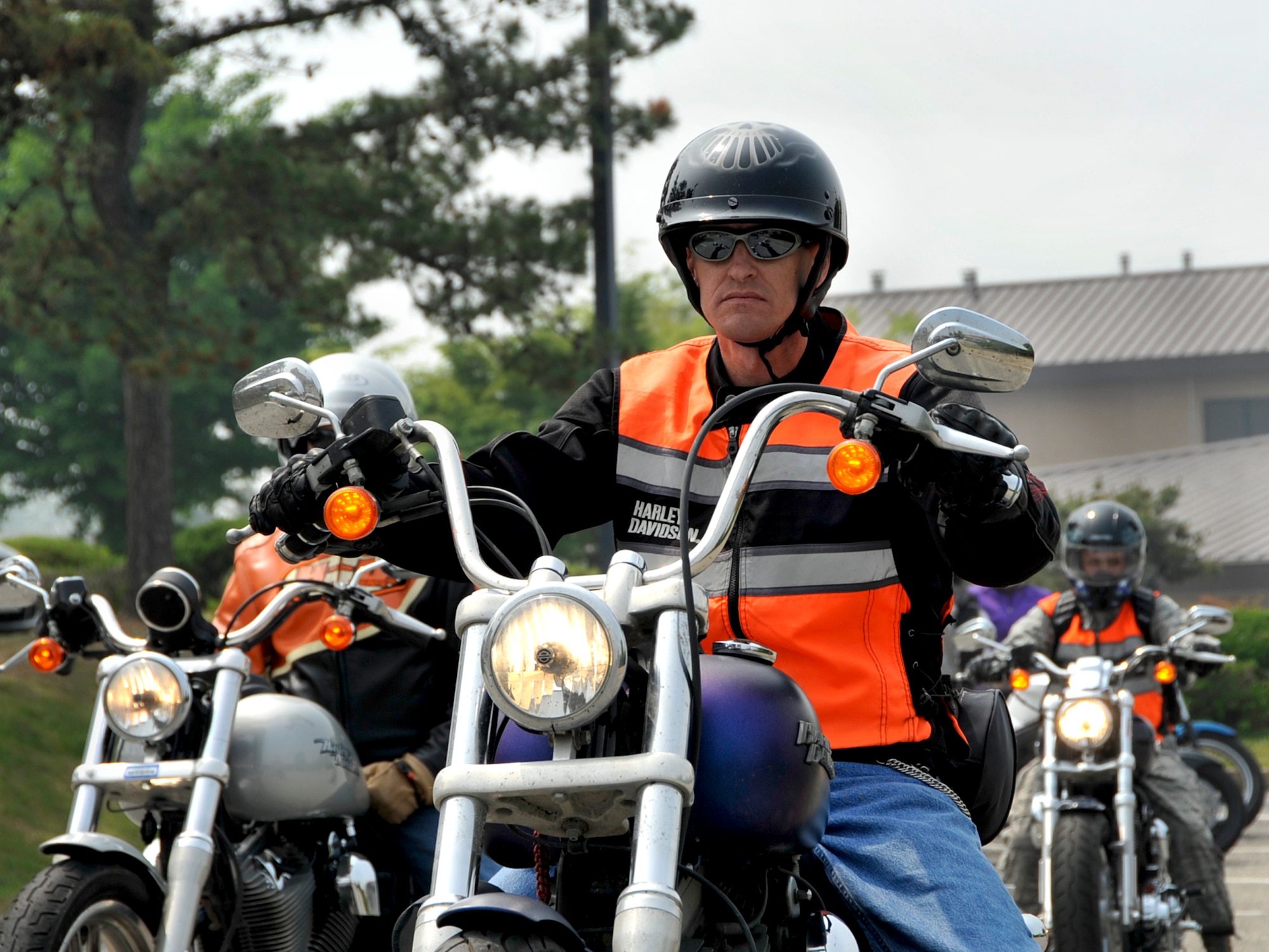 Master Sgt. Carter Urban, 51st Fighter Wing exercises and planning NCO in charge, leads a group motorcycle ride during the 101 Critical Days of Summer kick-off May 23, 2013. The campaign started with a fun run and a motorcycle safety class.  "Safe and Sound - All year round" is this year’s theme. (U.S. Air Force photo/Senior Airman Kristina Overton)