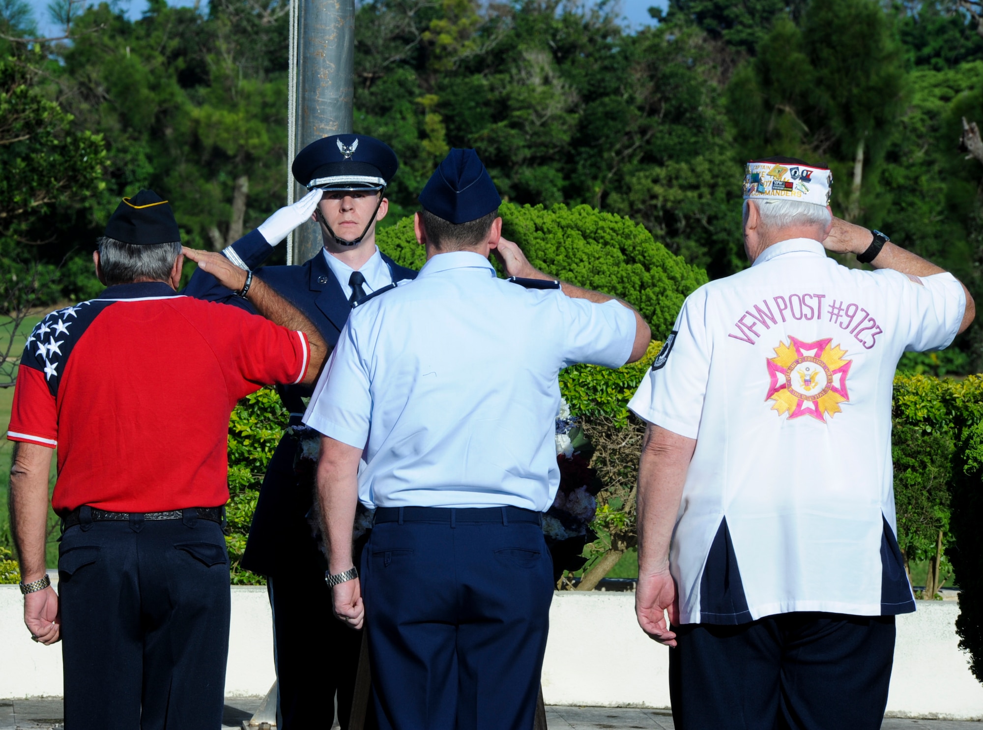 Representatives from the American Legion, Veterans of Foreign War and U.S. Air Force Brig. Gen. James Hecker, 18th Wing commander, conduct a wreath-laying ceremony during the Memorial Day ceremony on Kadena Air Base, Japan, May 27, 2013. The Memorial Day ceremony featured a wreath laying to remember those who made the ultimate sacrifice.  (U.S. Air Force photo by Airman 1st Class Justin Veazie/Released)