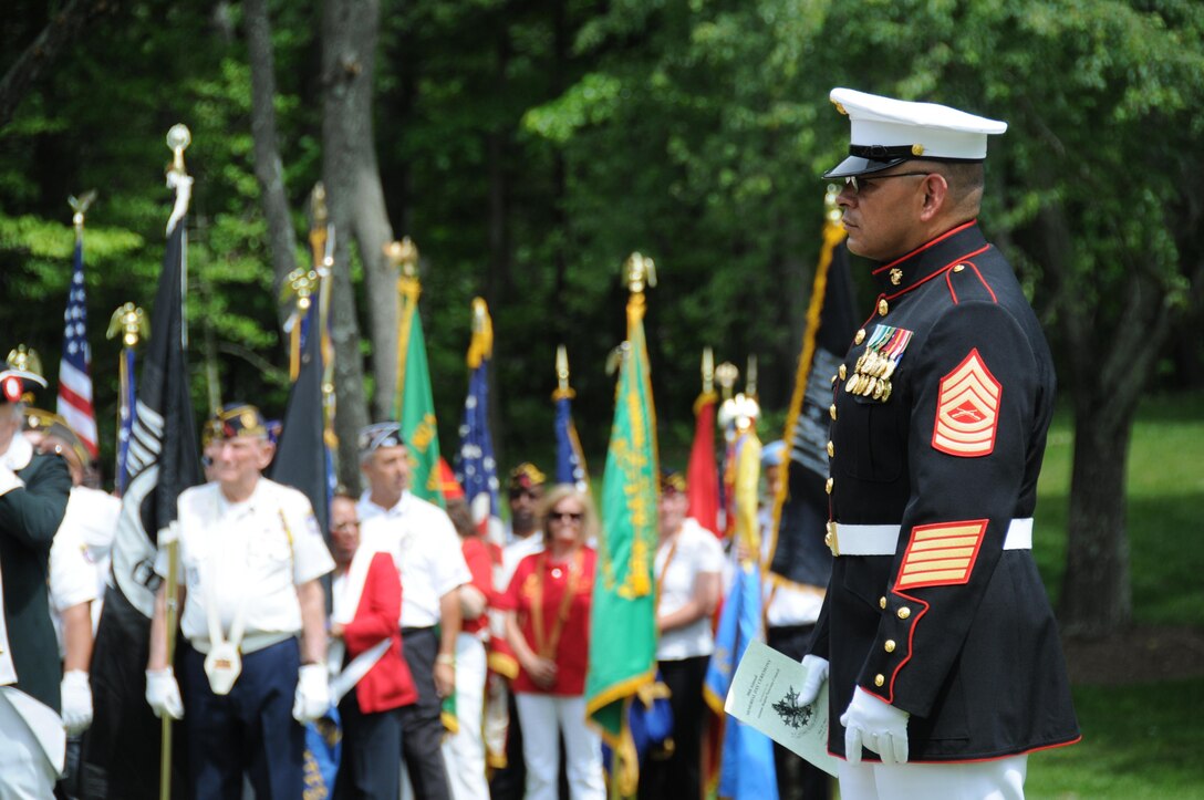 Master Sgt. J.S. Santoya, Marine Corps Base Quantico operations chief, oversees the formation of troops prior to the Potomac Region Veterans Council Memorial Day Ceremony held at Quantico National Cemetery on May 27, 2013.The event has been held for 30 years, paying homage fallen service members.