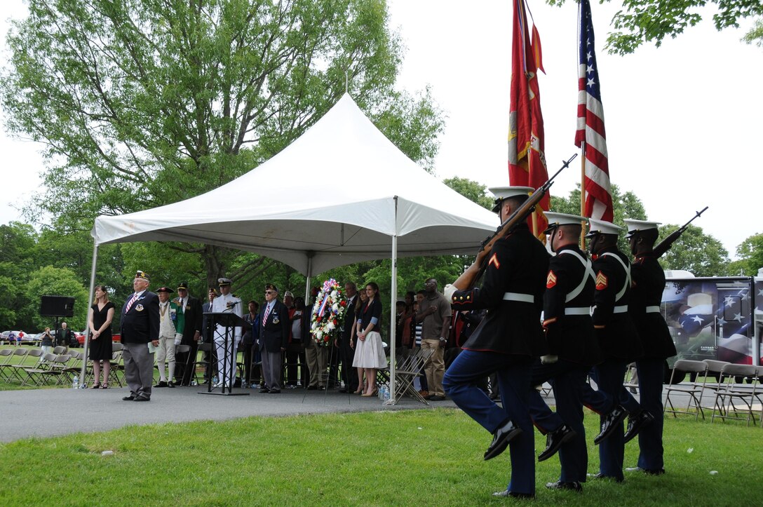 The Marine Corps Base Quantico color guard move to position after marching on the colors during the Potomac Region Veterans Council Memorial Day Ceremony was held at Quantico National Cemetery on May 27, 2013.  The event has been held for 30 years, paying homage fallen service members.