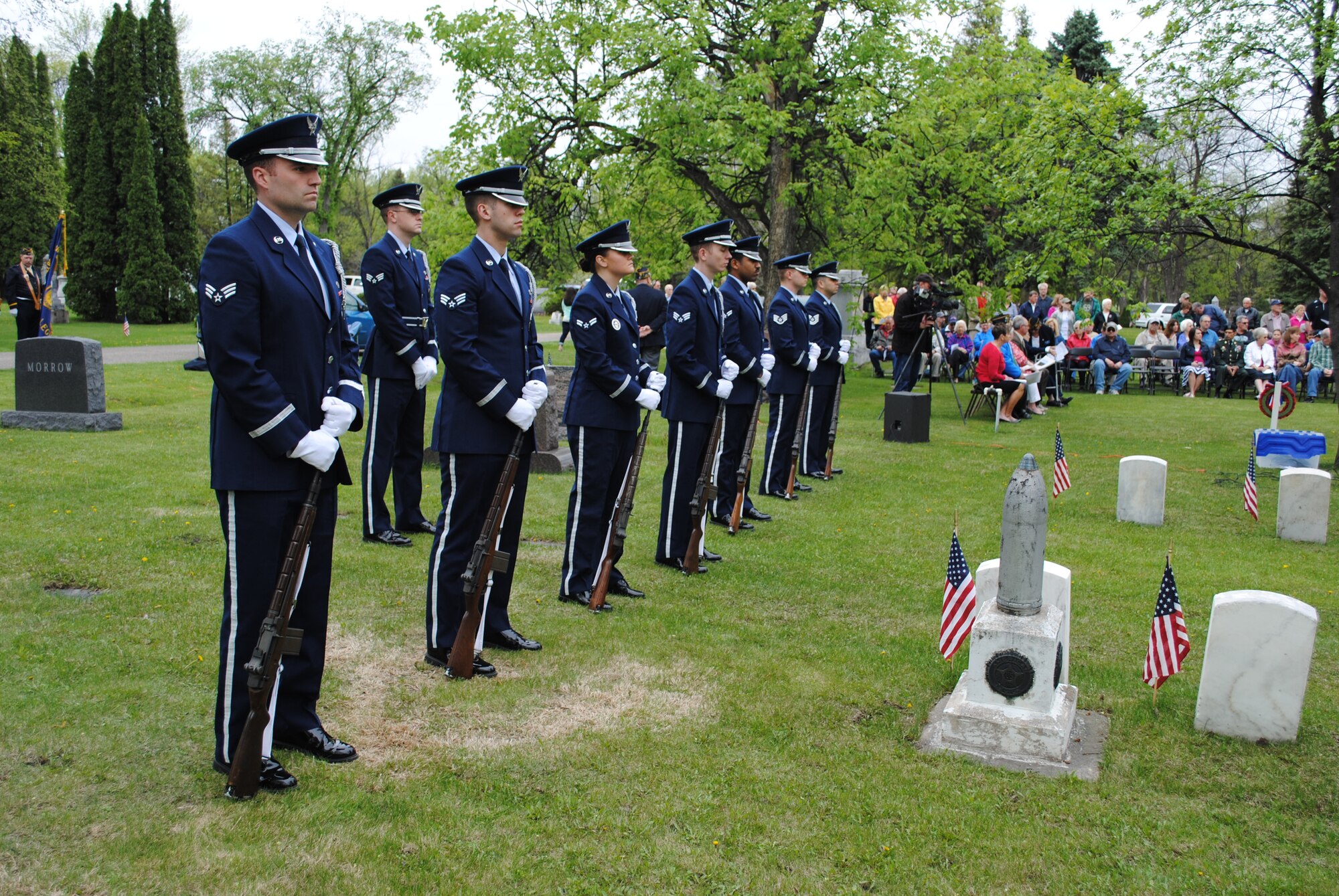 Members of the Grand Forks Air Force Base Honor Guard stand at parade rest during a Memorial Day ceremony on May 24, 2013, at Memorial Park Cemetery in Grand Forks, N.D. The Honor Guard performed a firing squad salute during the event. (U.S. Air Force photo/Staff Sgt. Luis Loza Gutierrez)
