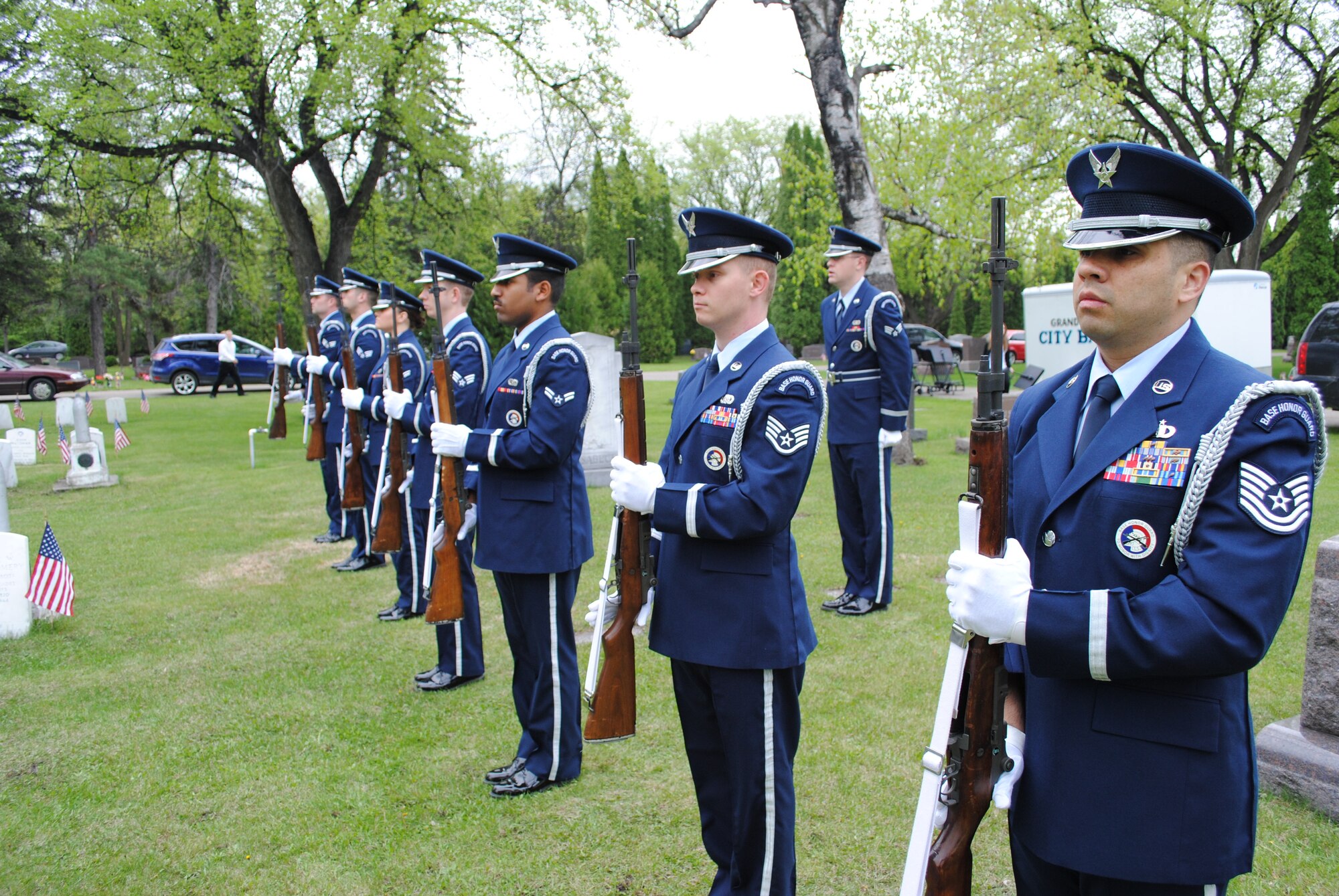 Members of the Grand Forks Air Force Base Honor Guard present arms during a Memorial Day ceremony on May 24, 2013, at Memorial Park Cemetery in Grand Forks, N.D. The first Memorial Day originated after the American Civil War and is observed annually in memory of fallen U.S. service members. (U.S. Air Force photo/Staff Sgt. Luis Loza Gutierrez)
