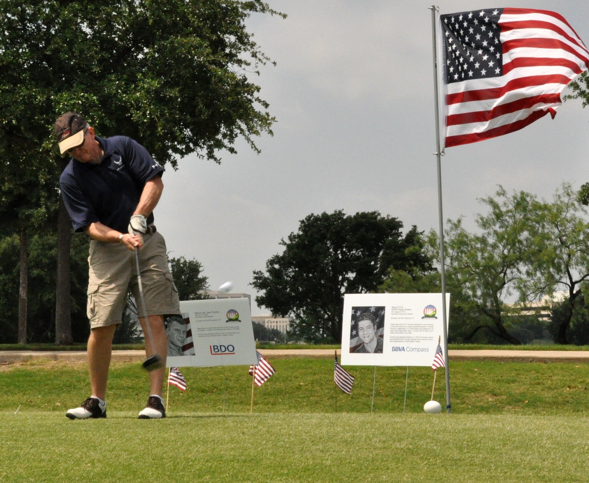 Maj. Gen. Bill Binger, 10th Air Force commander, hits a long drive off the 6th tee at the Portraits of Patriotism Charity Golf Tournament recently. The tournament, held at Hackberry Creek Country Club in Irving, Texas, benefitted The American Fallen Soldiers Project, which helps provide comfort and healing to the mourning families of our fallen military men and women. (U.S. Air Force photo/Master Sgt. Julie Briden-Garcia)