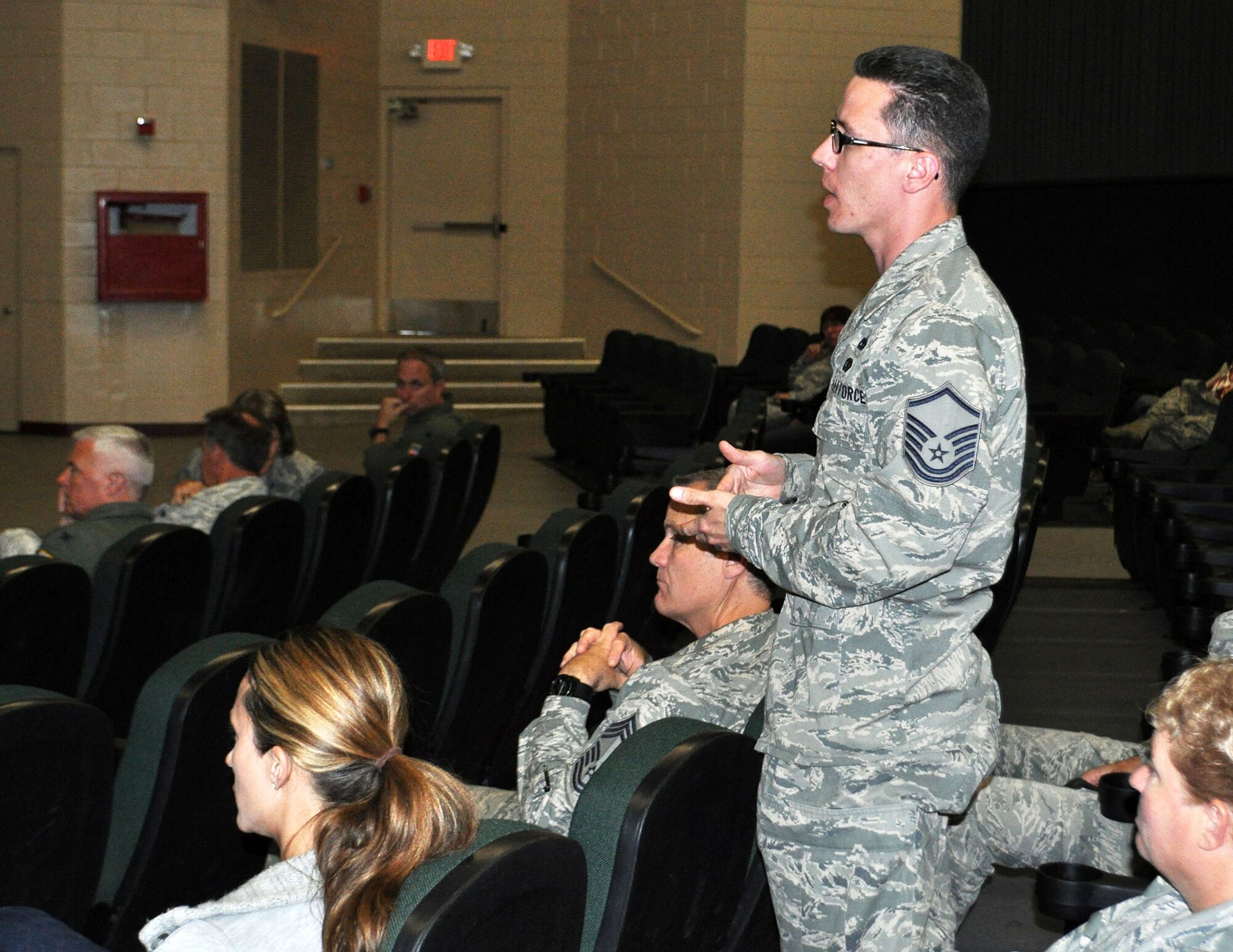 TRAVIS AIR FORCE BASE, Calif. -- Master Sgt. Anthony Marquez, 349th Maintenance Operations Flight, poses a question regarding limits to child care at a May 23, 2013 Civilian Commander's Call for the 349th AMW here. He is just one of about 350 civilian employees of the wing facing 11 unpaid furlough days handed down by the DoD. (U.S. Air Force photo/Ellen Hatfield) 
