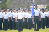 Members from Joint Base San Antonio Fort Sam Houston, Lackland and Randolph stand in formation during the 502nd Air Base Wing and Joint Base San Antonio change of command ceremony May 29, 2013, at 9 a.m. at JBSA-Fort Sam Houston's MacArthur Parade Field. Incoming commander Robert D. LaBrutta is the third commander of the 502nd ABW and JBSA, which provides installation support for JBSA-Fort Sam Houston, Lackland, Randolph, and Camp Bullis. JBSA is the largest joint base in the Department of Defense. (U.S. Air Force photo by Benjamin Faske) (released)