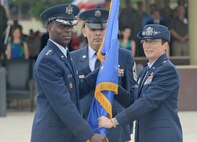 U.S. Air Force Gen. Edward A. Rice Jr., Air Education and Training Command commander, receives the guidon from outgoing commander Brig. Gen. Theresa C. Carter during the 502nd Air Base Wing and Joint Base San Antonio change of command ceremony May 29, 2013, at 9 a.m. at JBSA-Fort Sam Houston's MacArthur Parade Field. LaBrutta is the third commander of the 502nd ABW and JBSA, which provides installation support for JBSA-Fort Sam Houston, Lackland, Randolph, and Camp Bullis. JBSA is the largest joint base in the Department of Defense. His previous assignment was at U.S. Central Command, MacDill Air Force Base, Fla., where he was the director of manpower and personnel. (U.S. Air Force photo by Benjamin Faske) (released)