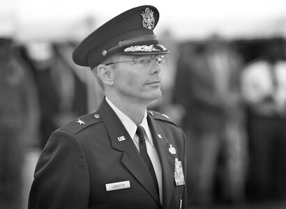 U.S. Air Force Brig. Gen. Robert D. LaBrutta looks on during the 502nd Air Base Wing and Joint Base San Antonio change of command ceremony May 29, 2013, at 9 a.m. at JBSA-Fort Sam Houston's MacArthur Parade Field. LaBrutta is the third commander of the 502nd ABW and JBSA, which provides installation support for JBSA-Fort Sam Houston, Lackland, Randolph, and Camp Bullis. JBSA is the largest joint base in the Department of Defense. His previous assignment was at U.S. Central Command, MacDill Air Force Base, Fla., where he was the director of manpower and personnel. (U.S. Air Force photo by Benjamin Faske) (released)