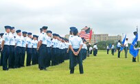 Members from JBSA-Fort Sam Houston, Lackland and Randolph stand in formation during the 502nd Air Base Wing and Joint Base San Antonio change of command ceremony May 29, 2013, at 9 a.m. at JBSA-Fort Sam Houston's MacArthur Parade Field. The incoming commander Brig. Gen. Robert D. LaBrutta is the third commander of the 502nd ABW and JBSA, which provides installation support for JBSA-Fort Sam Houston, Lackland, Randolph, and Camp Bullis. JBSA is the largest joint base in the Department of Defense. (U.S. Air Force photo by Benjamin Faske) (released)