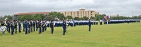 Members from JBSA-Fort Sam Houston, Lackland and Randolph stand in formation during the 502nd Air Base Wing and Joint Base San Antonio change of command ceremony May 29, 2013, at 9 a.m. at JBSA-Fort Sam Houston's MacArthur Parade Field. The incoming commander, Brig. Gen. Robert D. LaBrutta is the third commander of the 502nd ABW and JBSA, which provides installation support for JBSA-Fort Sam Houston, Lackland, Randolph, and Camp Bullis. (U.S. Air Force photo by Benjamin Faske) (released)