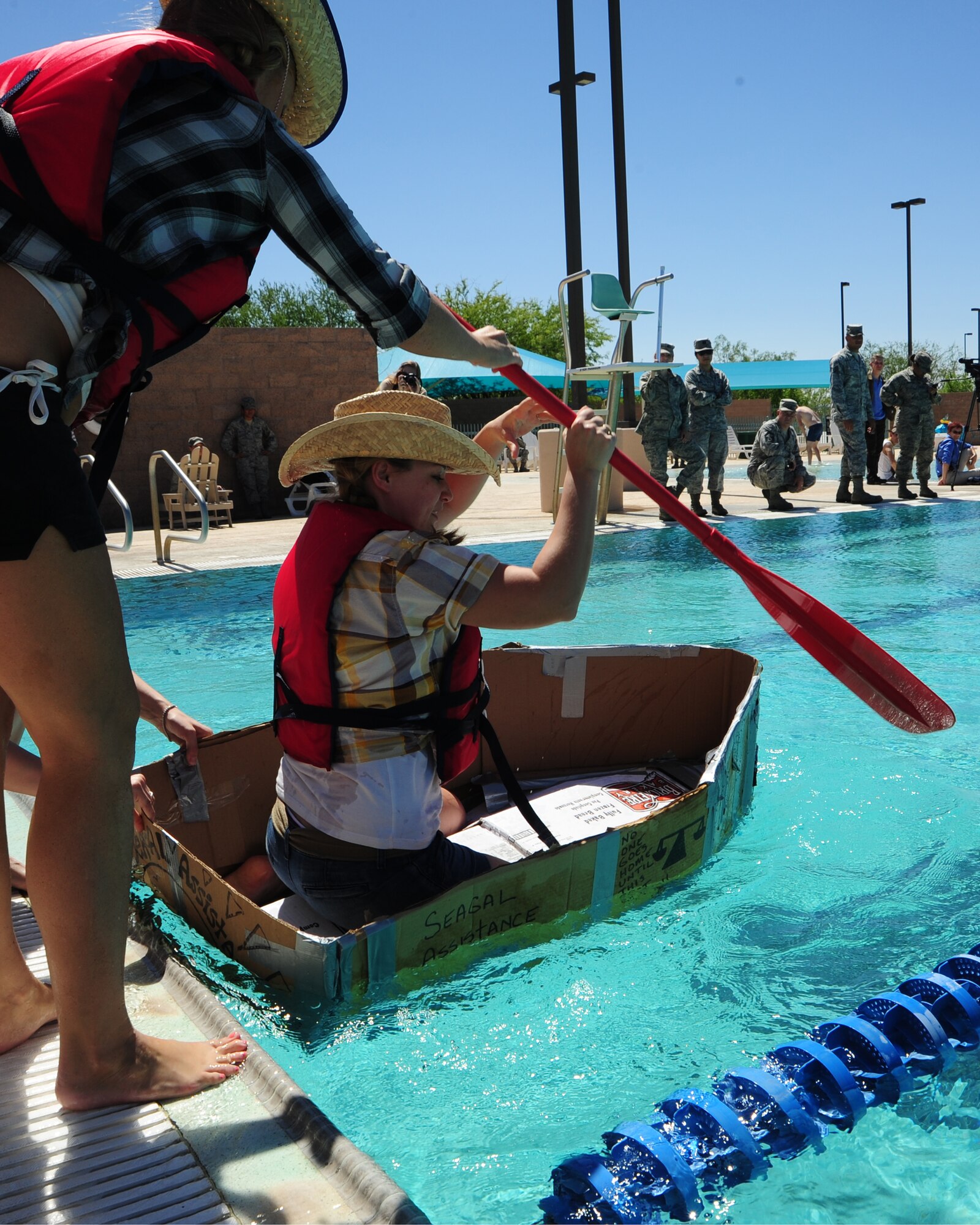U.S. Air Force Airmen from the 355th Fighter Wing Legal Office participated at the Build-A-Boat Competition during Comprehensive Airman Fitness Week's Build-A-Boat competition at Davis-Monthan Air Force Base, Ariz., May 23, 2013. This was the biggest Build-A-Boat competition held at D-M to date consiting of 20 teams of four members each. (U.S. Air Force photo by 1st Lt. Sarah Ruckriegle/Released)