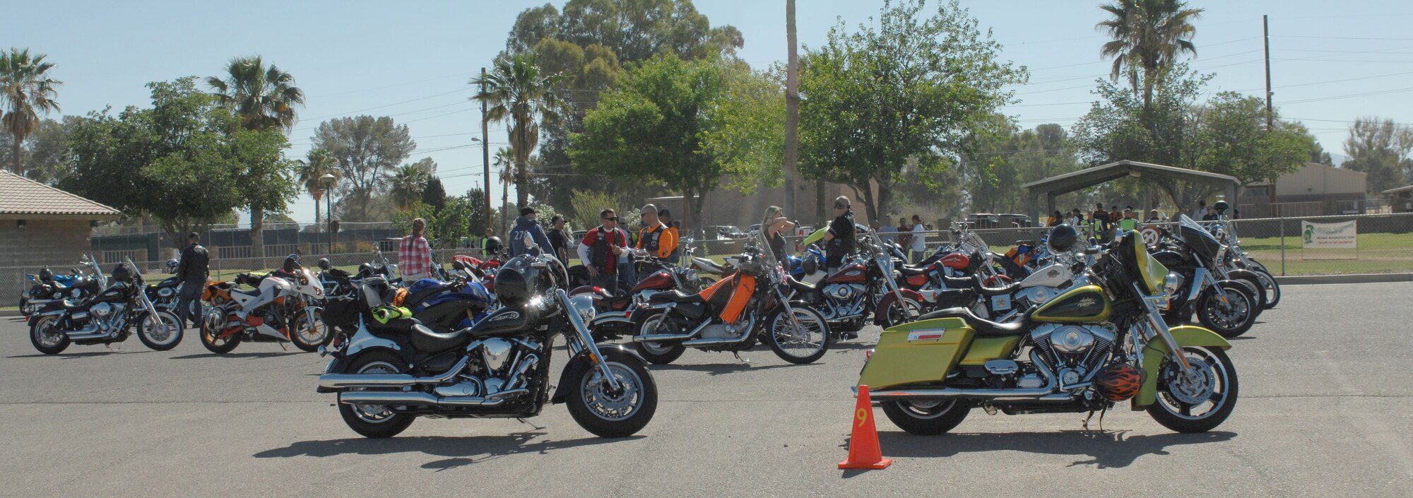 Motorcycles are lined up after riders sign up for the Green Knights Military Motorcycle Club's annual safety ride at Davis-Monthan Air Force Base, Ariz., May 23, 2013. The ride is designed to teach riders about safety as the motorcycle seasons starts. (U.S. Air Force photo by Airman 1st Class Betty R. Chevalier/Released)