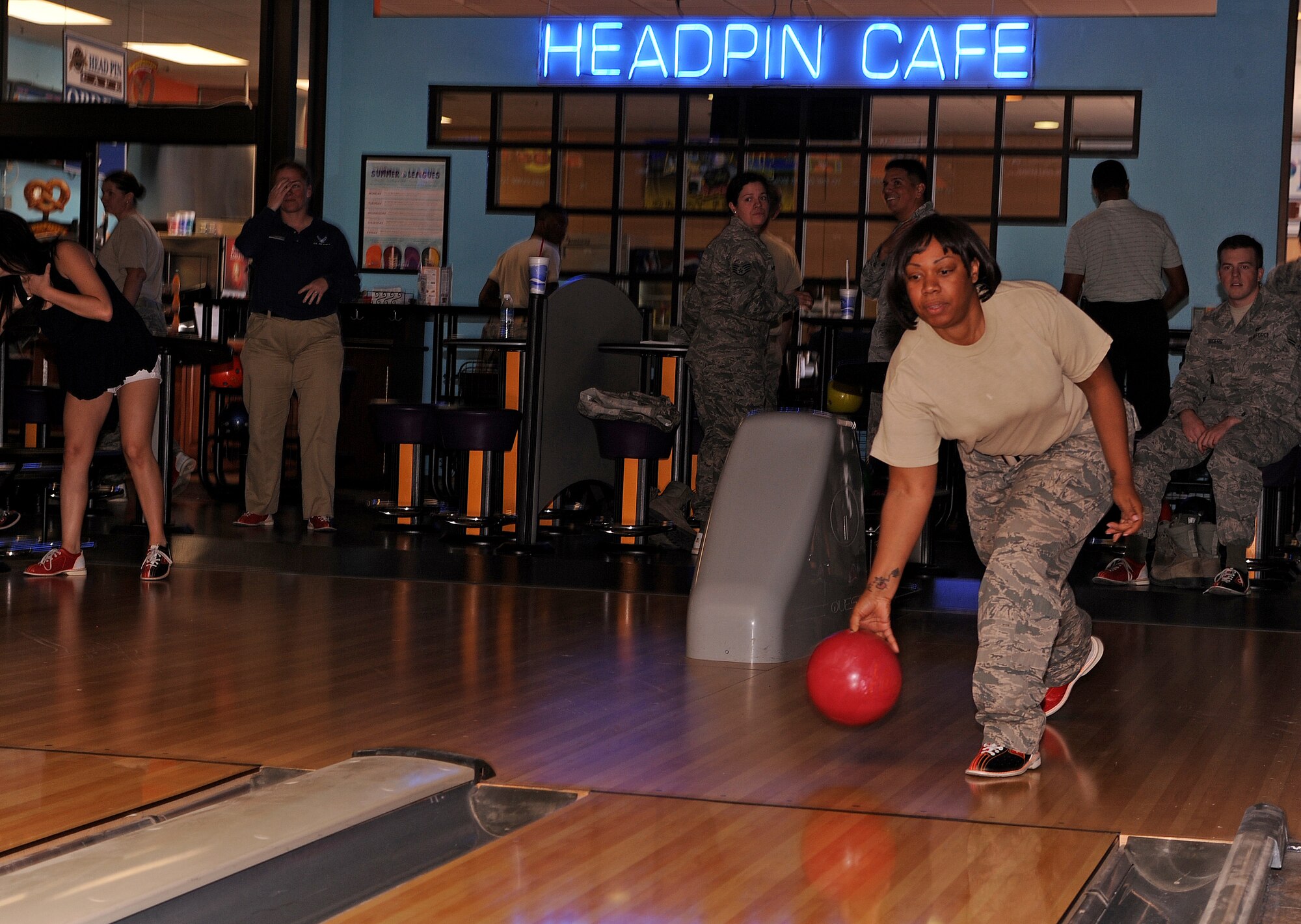 U.S. Air Force Staff Sgt. Erica Hill, 355th Operation Support Squadron participates in the Comprehensive Airman Fitness Week's Bowling Tournament at Davis-Monthan Air Force Base, Ariz., May 21, 2013. A total of 24 members participated in the bowling tournament. (U.S. Air Force photo by Airman 1st Class Christine Griffiths/Released) 