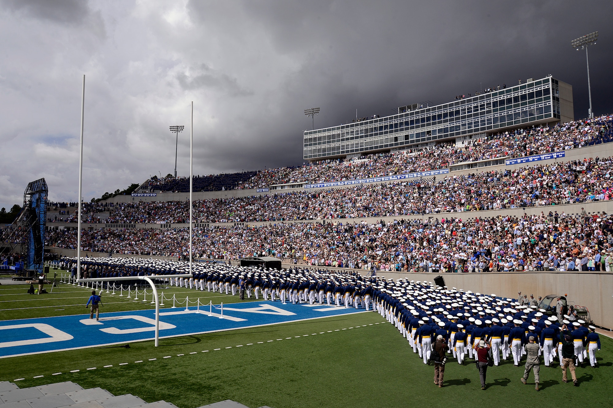 The U.S. Air Force Academy Class of 2013 marches into the Academy's Falcon Stadium for graduation in Colorado Springs, Colo. May 29, 2013.  1,024 graduates will be commissioned today.  (U.S. Air Force Photo by Mike Kaplan/Released)