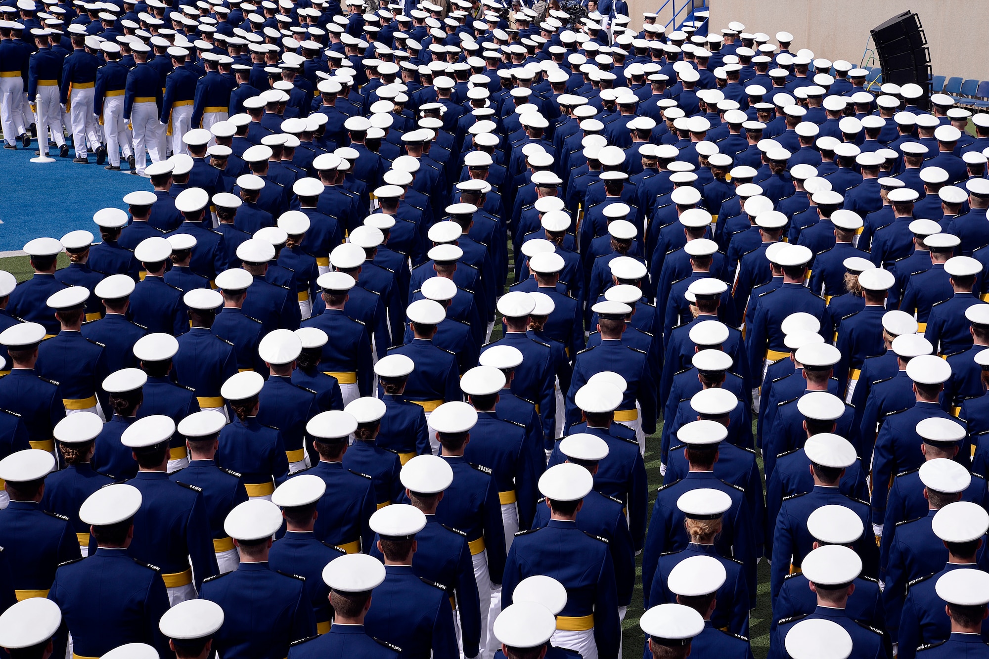 The U.S. Air Force Academy Class of 2013 marches into the Academy's Falcon Stadium for graduation in Colorado Springs, Colo. May 29, 2013.  1,024 graduates will be commissioned today.  (U.S. Air Force Photo by Mike Kaplan/Released)