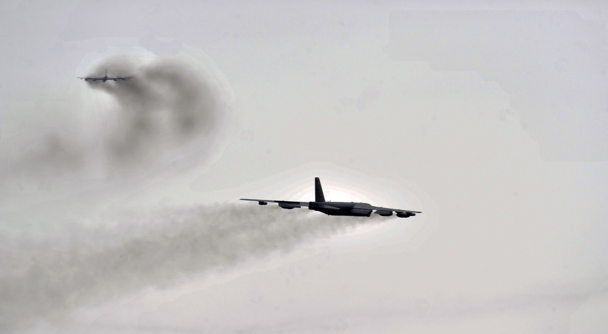 MINOT AIR FORCE BASE, N.D. – Two B-52H Stratofortresses take off during a training exercise here, May 21. Air Force Global Strike Command routinely conducts training operations and exercises to ensure its forces can perform their mission when called upon at any time.  (U.S. Air Force photo/Senior Airman Brittany Y. Auld)
