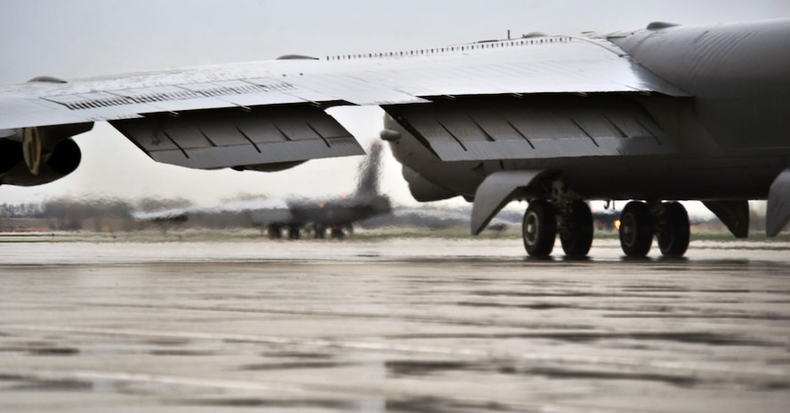 MINOT AIR FORCE BASE, N.D. -- Two B-52H Stratofortresses taxi onto the runway during a training exercise here, May 21. Air Force Global Strike Command routinely conducts training operations and exercises to ensure its forces can perform their mission when called upon at any time.  (U.S. Air Force photo/Senior Airman Brittany Y. Auld)