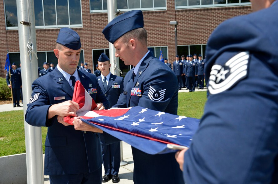 MCGHEE TYSON AIR NATIONAL GUARD BASE, Tenn. – U.S. Air National Guard Tech Sgt. Robert Martin from the 101st Maintenance Squadron, Bangor Maine, attending Noncommissioned Officer Academy Class 13-6 at the I.G. Brown Training and Education Center participates in a graduation retreat ceremony, May 23, 2013.  (U.S. Air National Guard photo by Master Sgt. Kurt Skoglund/Released)