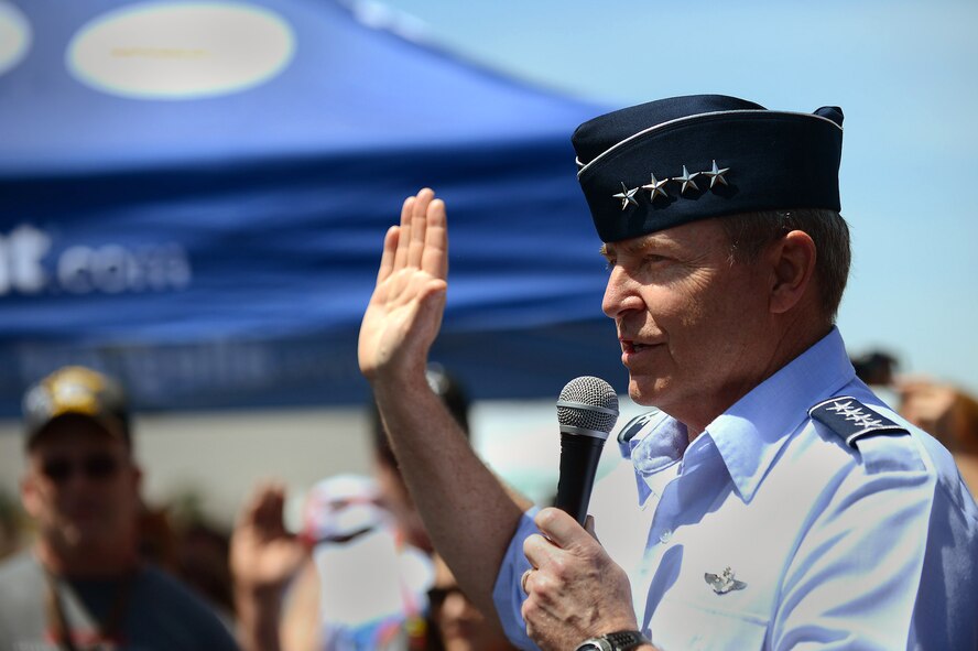 Air Force Chief of Staff Gen. Mark A. Welsh III gives the oath of enlistment to recruits in the Delayed Entry Program at a NASCAR race, Charlotte, N.C., May 26, 2013. (U.S. Air Force photo/Airman 1st Class Nicole Sikorski)