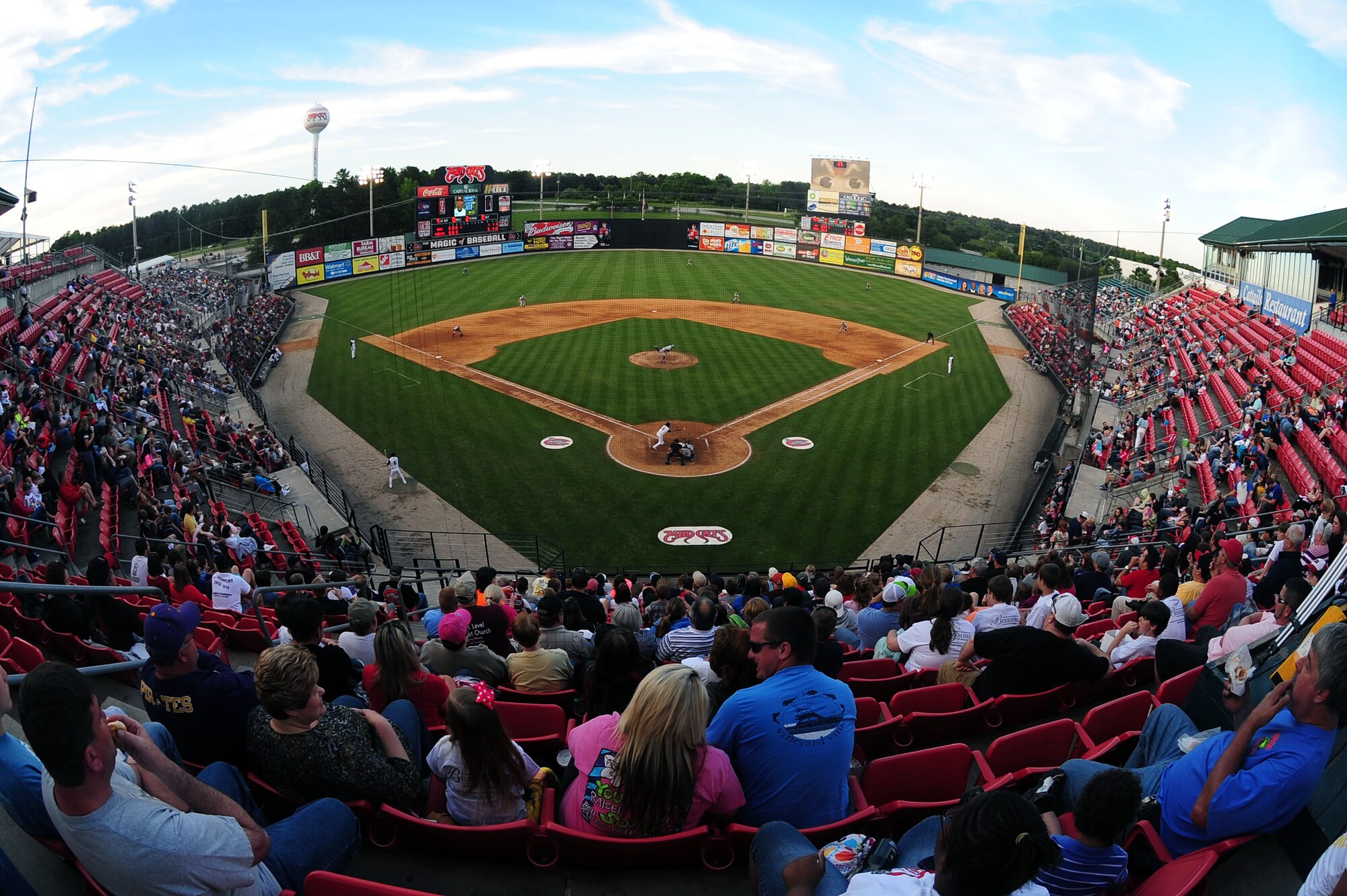 Fans in the crowd watch as the Carolina Mudcats took on the Winston-Salem Dash at the Carolina Mudcats stadium in Zebulon, N.C., May 25, 2013. Service members from the local area gathered to partake in the military appreciation game sponsored by the Mudcats staff. (U.S. Air Force photo by Airman 1st Class John Nieves Camacho/Released)