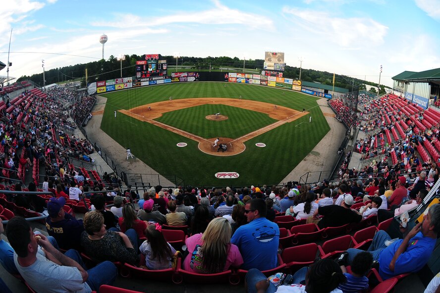 Fans in the crowd watch as the Carolina Mudcats took on the Winston-Salem Dash at the Carolina Mudcats stadium in Zebulon, N.C., May 25, 2013. Service members from the local area gathered to partake in the military appreciation game sponsored by the Mudcats staff. (U.S. Air Force photo by Airman 1st Class John Nieves Camacho/Released)