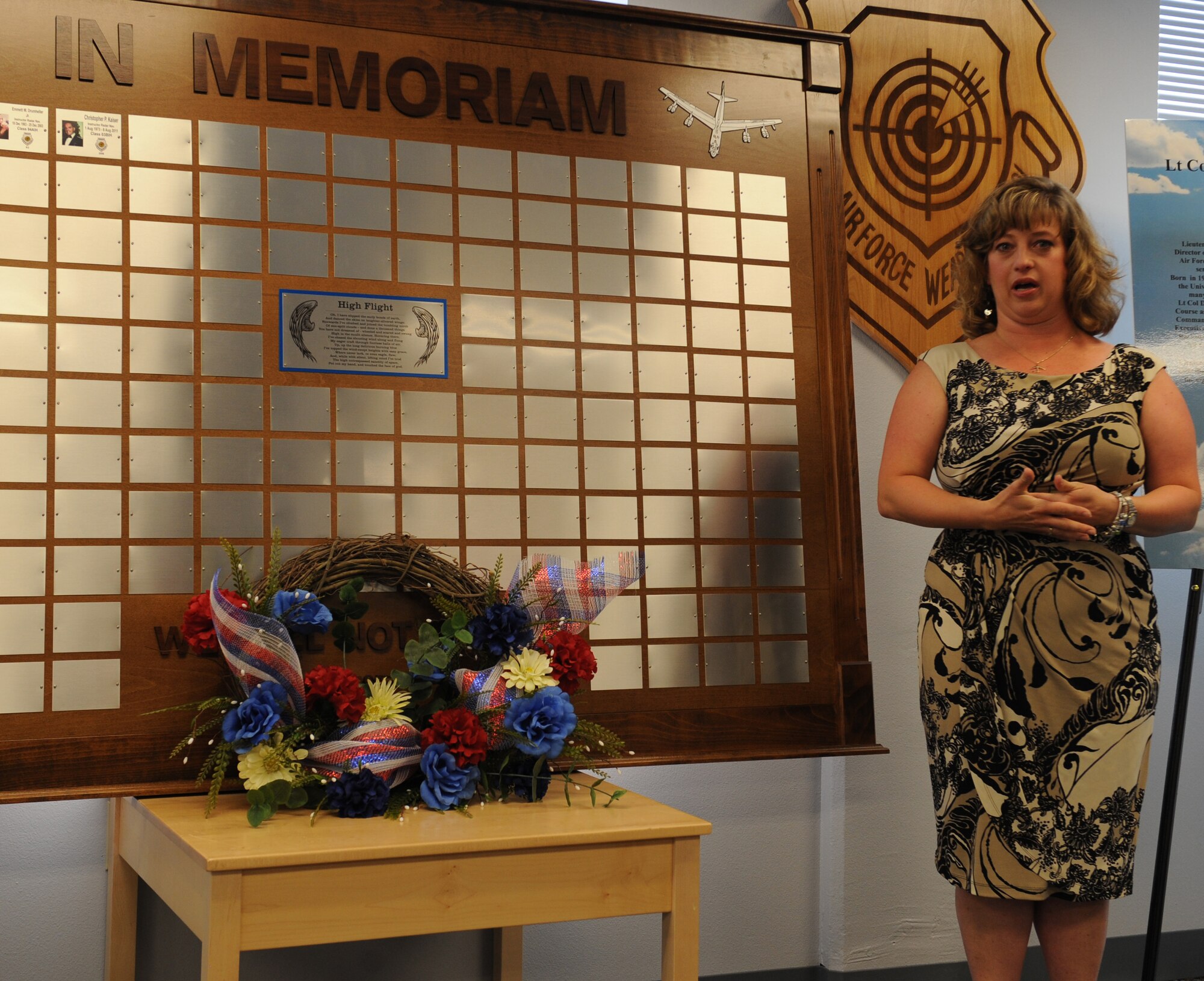 The widow of Lt. Col. Christopher Kaiser speaks about her husband during a memorial ceremony on Barksdale Air Force Base, La., May 26, 2013. The 340th Weapons Squadron honored four deceased graduates from the B-52 instructor course. The four aviators had over 550 combined combat flying hours during their time in the Air Force. (U.S. Air Force photo/Airman 1st Class Benjamin Gonsier)
