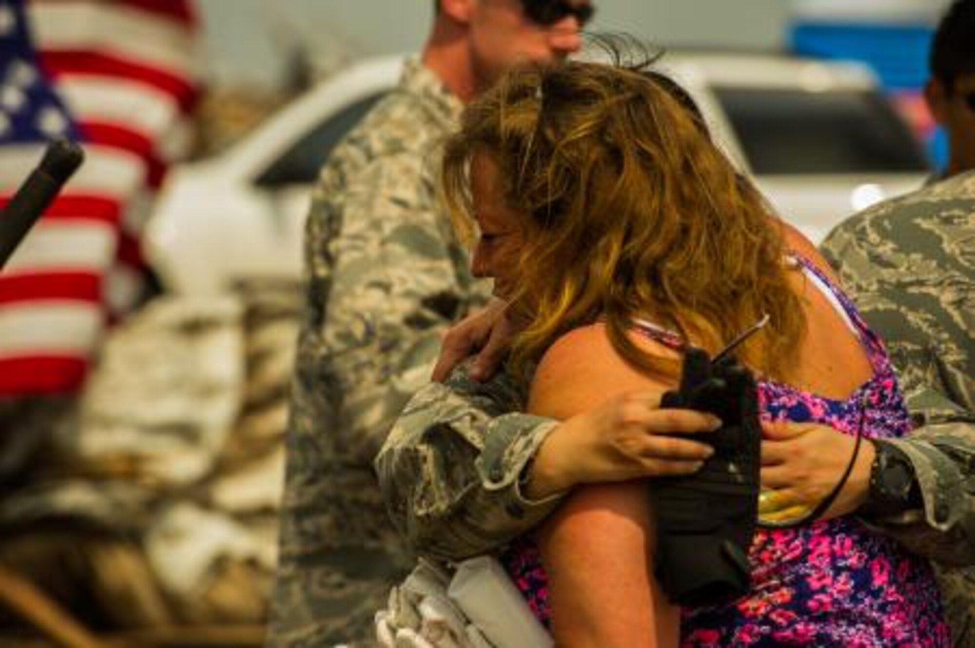 Mona Thomas expresses her appreciation for 1st Lt. Linna De Cuir for helping her find a few sentimenal items in the rubble of her Moore, Okla., residence, May 24, 2013. Her home was leveled by an EF-5 tornado that ripped through the town May 20. More than 600 airmen from the greater Oklahoma area volunteered to assist in the relief efforts. Du Cuir is assigned to the 964th Airborne Air Control Squadron and hails from Lincolnton, N.C. Other volunteers came from Vance AFB, Okla., and Altus, Okla. (U.S. Air Force photo by Staff Sgt. Jonathan Snyder)

