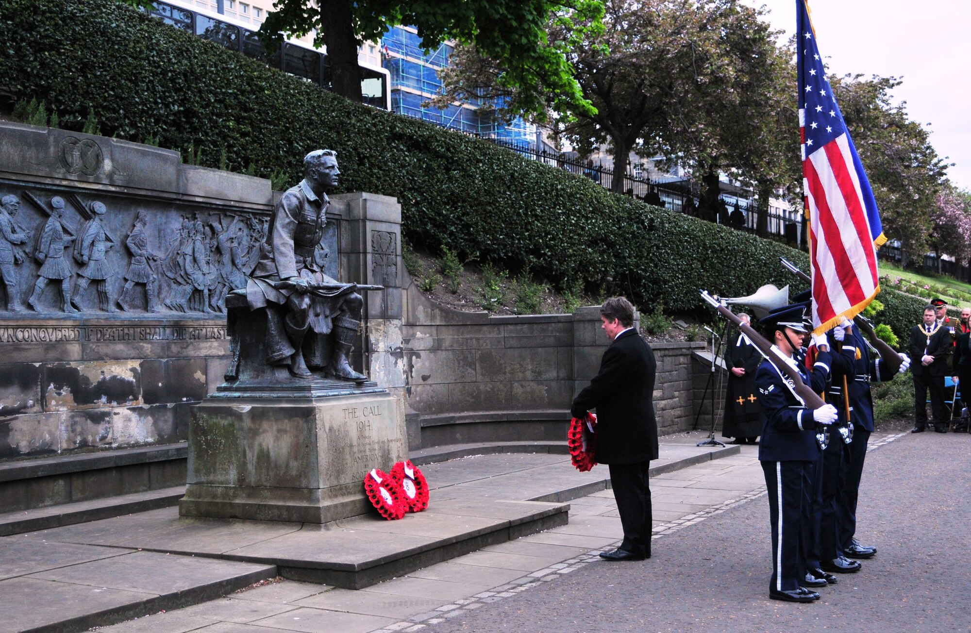 EDINBURGH, Scotland—Member of Scottish Parliament Keith Brown, Minister for Transport and Veterans, lays a wreath in front of “The Call” war monument during the 79th Scottish American Memorial Day Service May 27, 2013.  Representing the Scottish Government, Brown joined other representatives from the U.S. Government, the British Armed Forces, the Royal British Legion, and the English-Speaking Union to pay tribute to those who sacrificed their lives in war. (U.S. Air Force photo by 1st Lt. Lyndsey Horn)