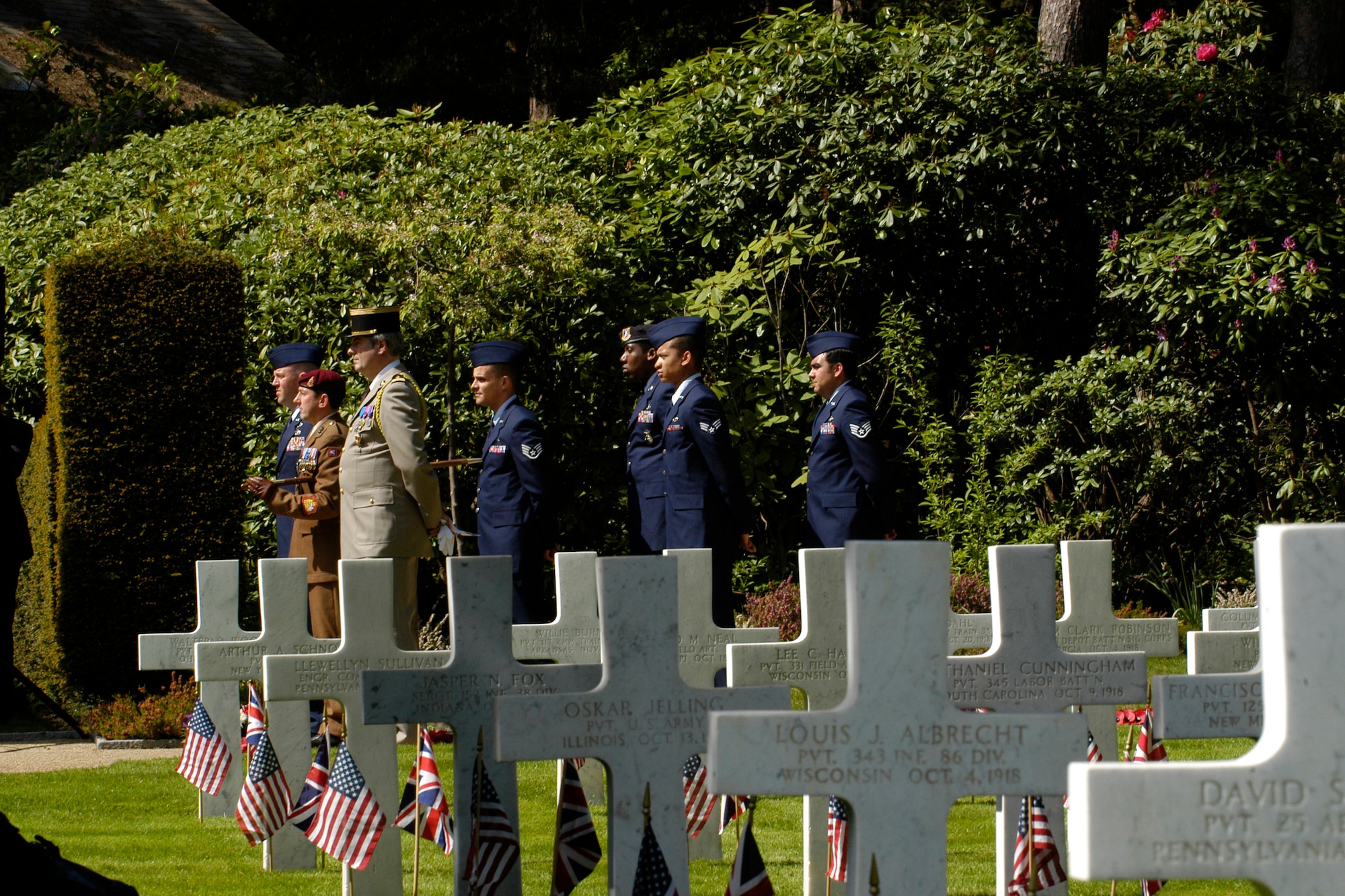 BROOKWOOD, United Kingdom – Members of the 422nd Air Base Group, and British Army 2nd Army Training Regiment, Army Training Centre, from Pirbright, United Kingdom, stand in formation during a Memorial Day Ceremony at Brookwood Military Cemetery, United Kingdom, May 26. Brookwood, the final resting place for 468 servicemembers and 41 unknown servicemembers from World War I, is one of the smallest American cemeteries in the United Kingdom. (U.S. Air Force photo by Tech. Sgt. Chrissy Best)