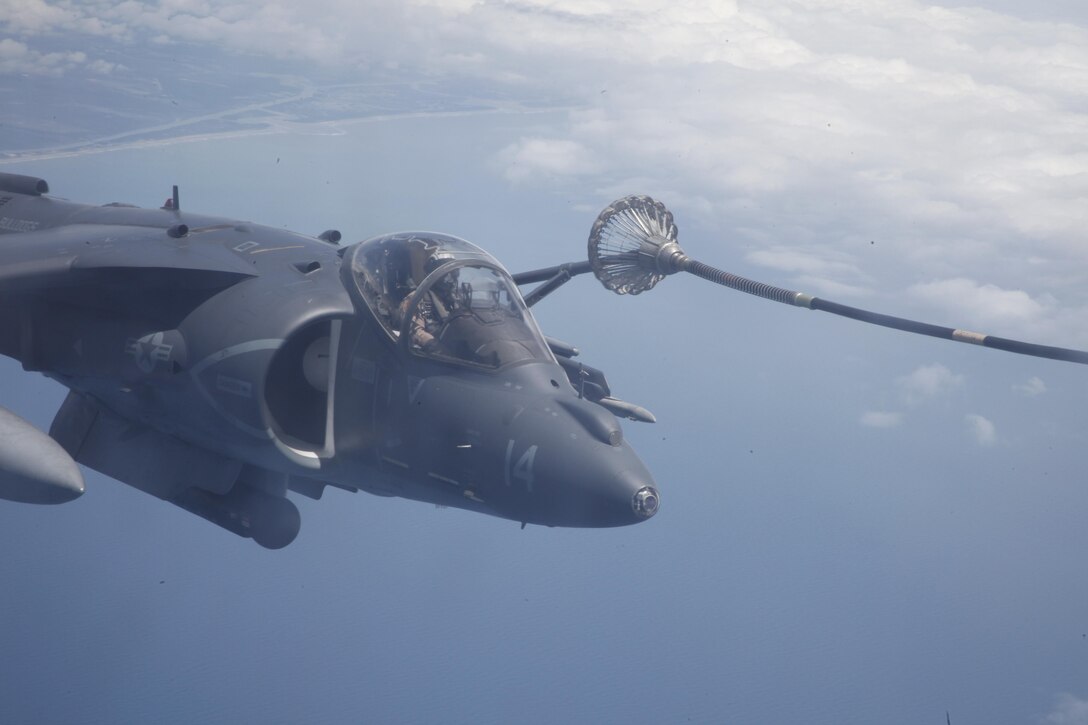 An AV-8B Harrier with Marine Attack Squadron 223 takes on fuel from a KC-130J with Marine Aerial Refueler Transport Squadron 252 during training May 22.

